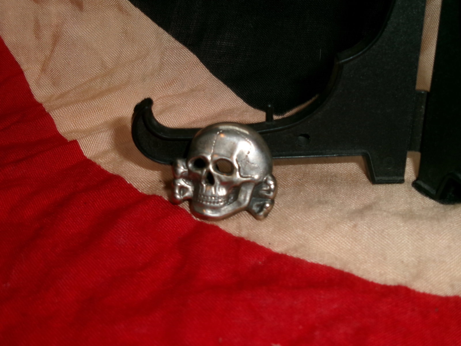 WWII German Waffen-SS Skull Cap Insignia (Totenkopf) Marked 409/41 (1 of 4)