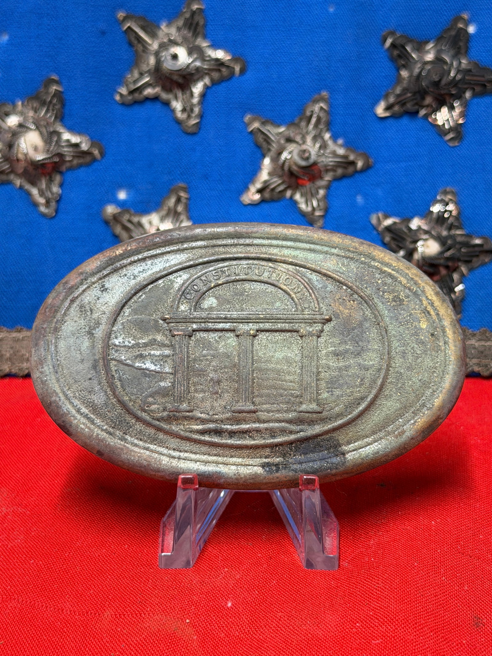 Civil War Georgia State Militia Belt Plate Recovered in Richmond Virginia: Offered here is a Georgia state belt plate recovered in Richmond, Virginia, featuring the well-known state seal motif with the word “CONSTITUTION” displayed above a columned arch. The plate re