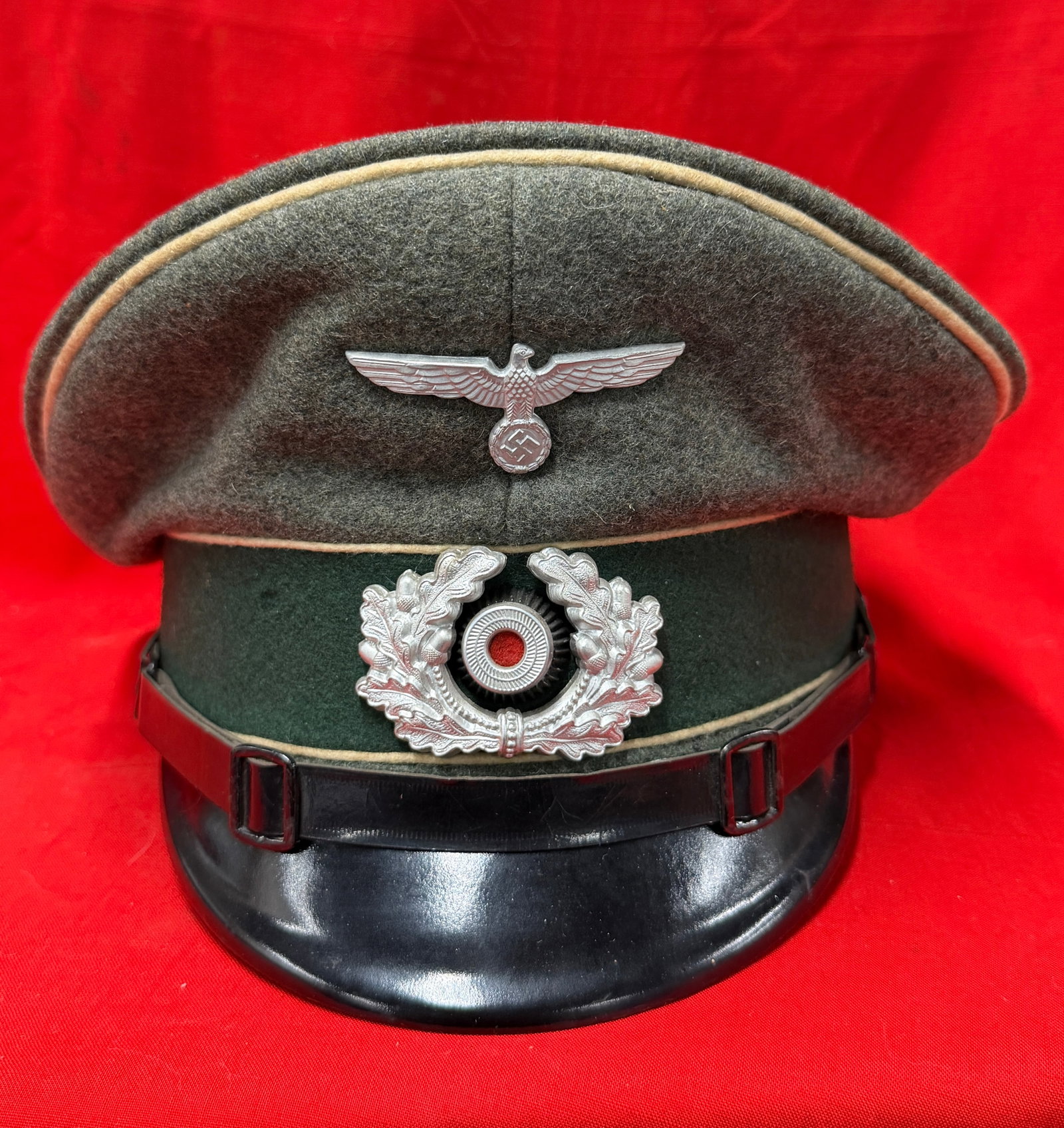 German WWII Army (Heer) Officer-Style Visor Cap with Silver Insignia and Dark Green Band (1 of 6)