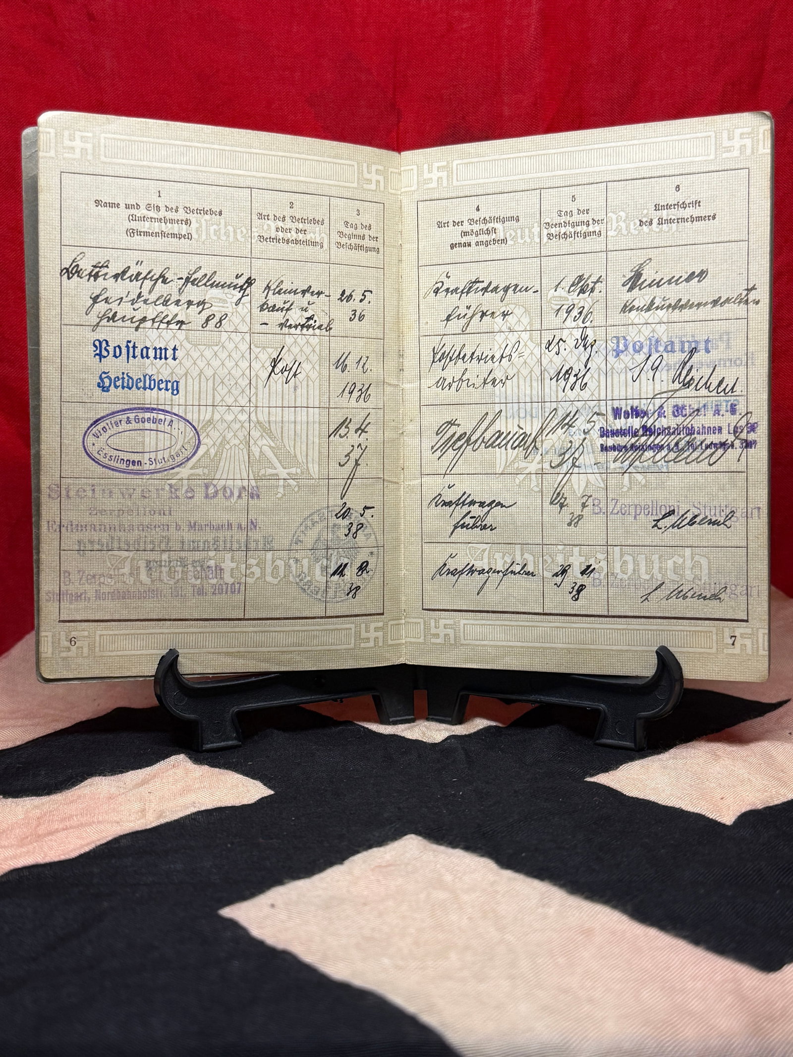 World War II German Arbeitsbuch (Labor Book) Issued to Wilhelm Seipp: Official German Arbeitsbuch (Labor Book) issued to Wilhelm Seipp under labor regulations enacted in 1935. The booklet contains multiple employment entries, company stamps, signatures, occupational cla