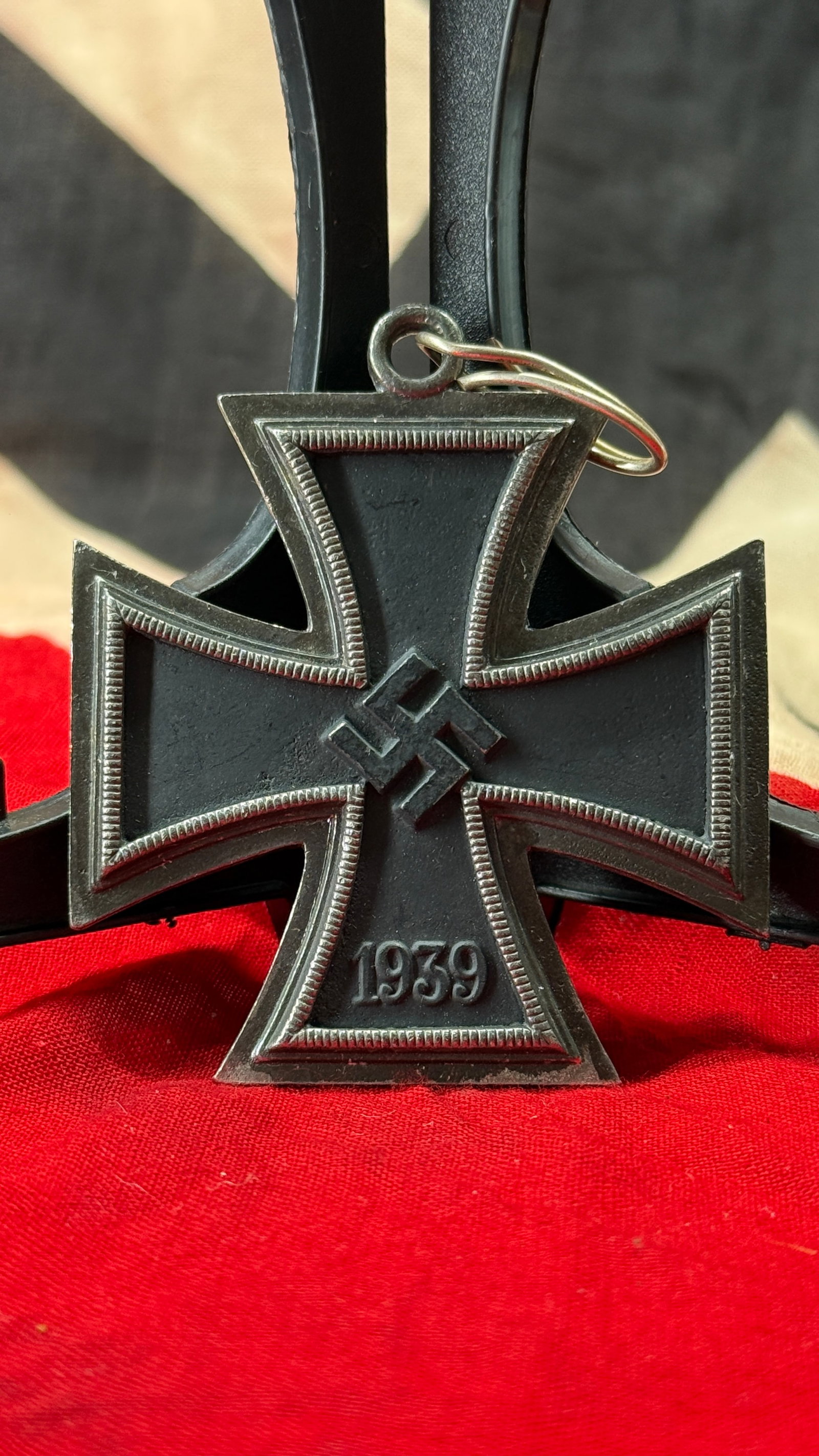 WWII German Iron Cross 2nd Class 1939 Medal: The World War II German Iron Cross 2nd Class (Eisernes Kreuz 2. Klasse) was reinstituted by Adolf Hitler on September 1, 1939, continuing a tradition first established in 1813. This medal displays the