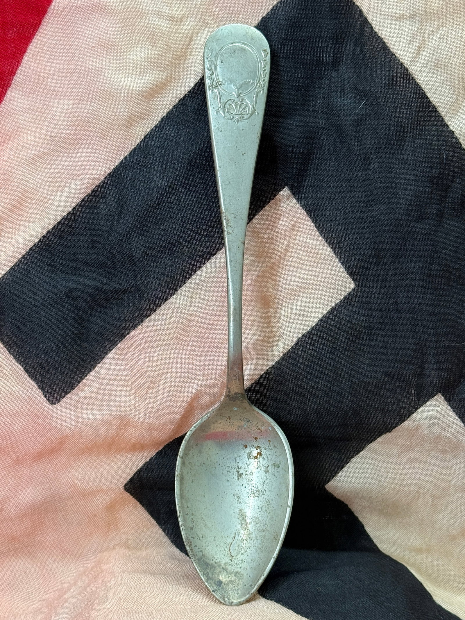 WWII German Hunting Association Decorative Serving Spoon: This WWII German Hunting Association decorative serving spoon features a classic elongated bowl and handle with an elegant Art Nouveau-style floral border surrounding a blank cartouche at the terminal