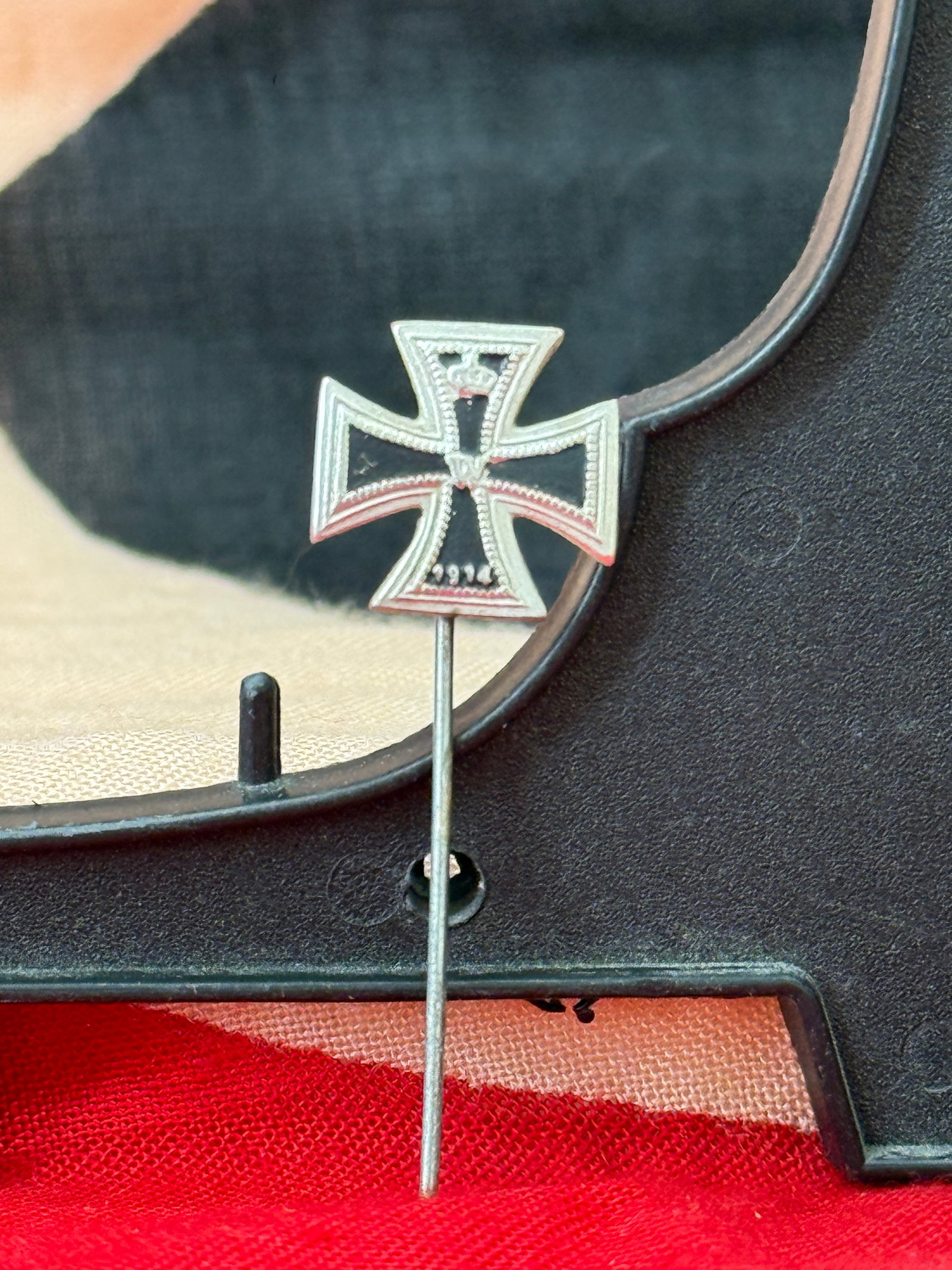 WWII German Iron Cross 2nd Class Miniature Stick Pin: This miniature stick pin depicts the 1939 Iron Cross 2nd Class with black enamel center panels, a silver-colored frame, and the date "1939" on the lower arm. Mounted on its original long straight pin,