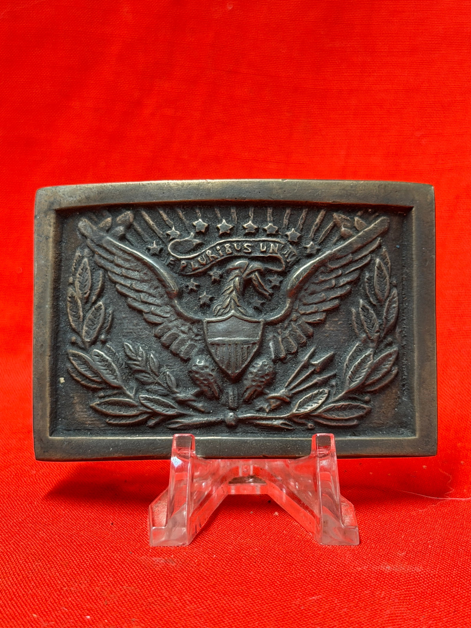 Civil War U.S. Eagle Waist Belt Plate Buckle: This rectangular brass waist belt plate features the iconic spread-winged Federal eagle with a shield upon its breast, an olive branch and arrows in its talons, and the motto "E Pluribus Unum" display