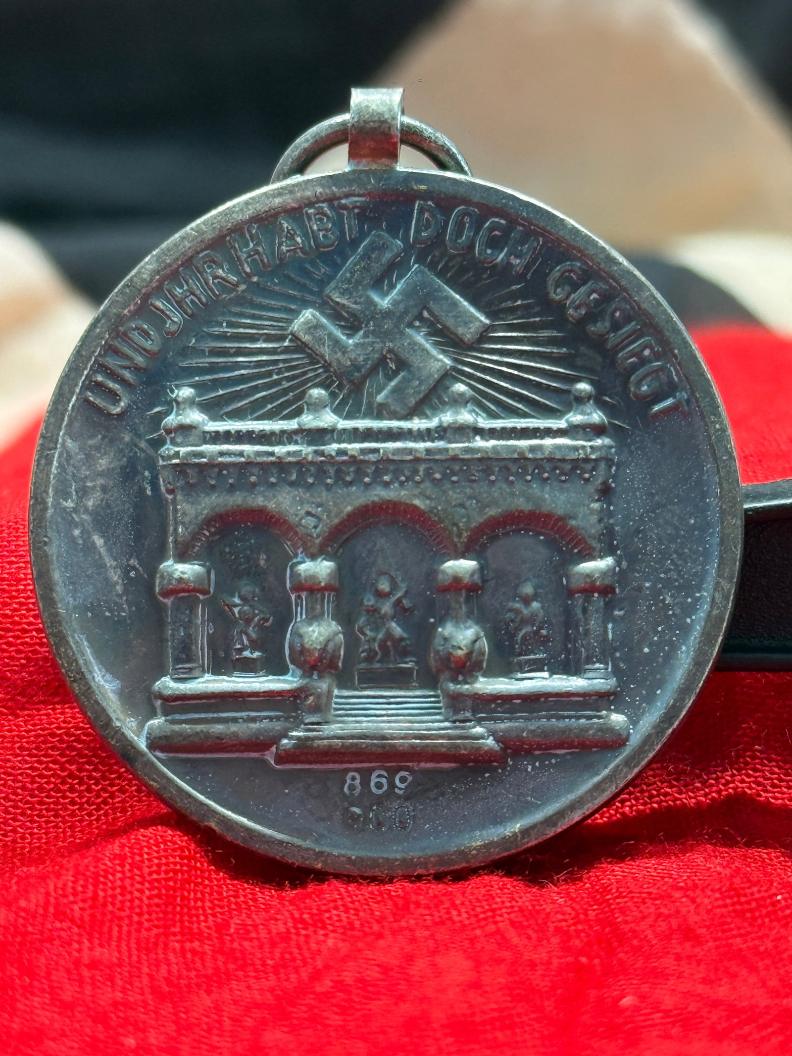 WW2 German 1933 Munich Beer Hall Putsch Commemorative Medal: This commemorative medal honors the tenth anniversary of the 1923 Munich Beer Hall Putsch, one of the defining events in the rise of the National Socialist movement. The obverse depicts the Feldherrnh