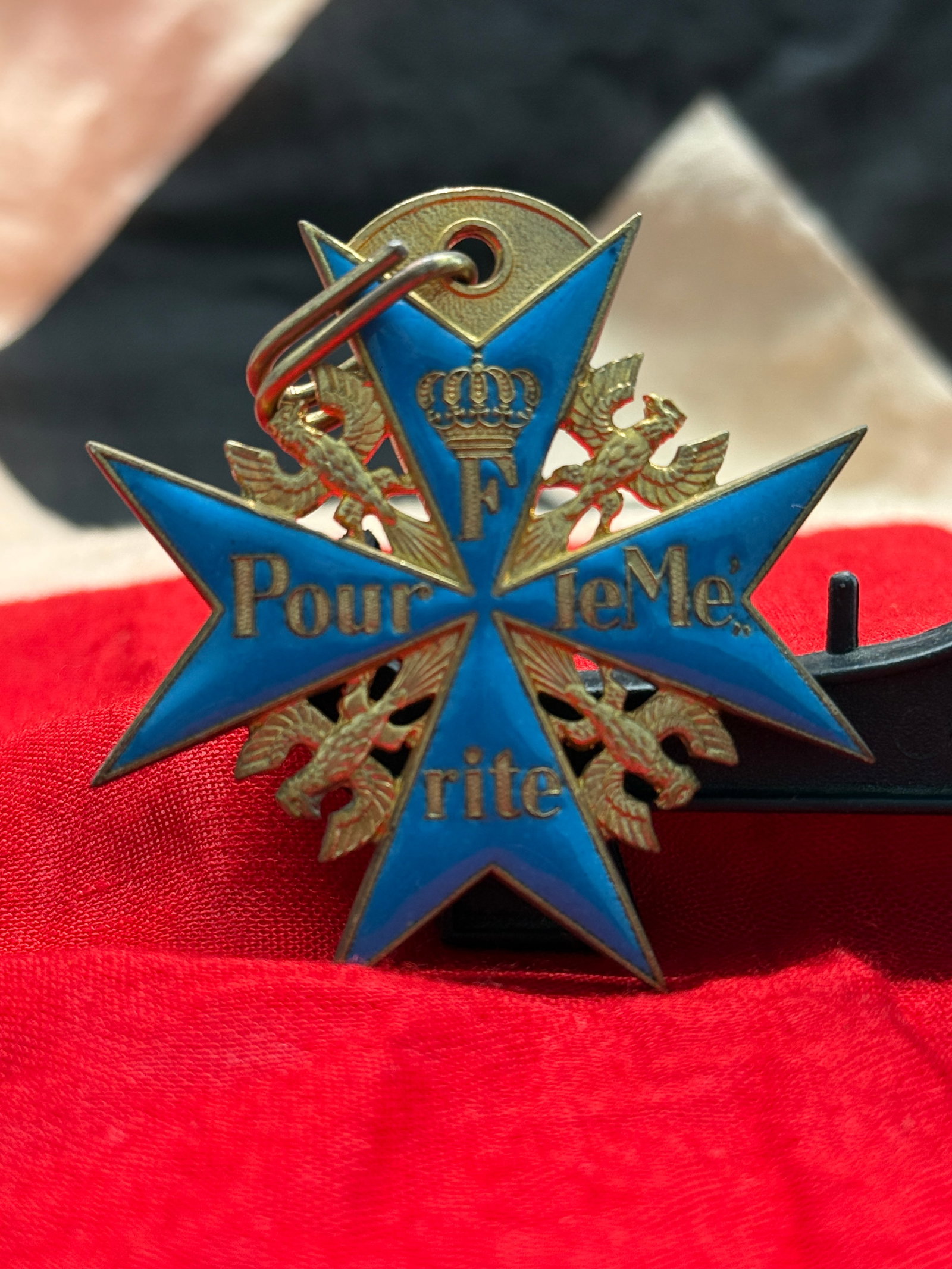 WW1 German Imperial "Blue Max" Pour le Mérite Medal: This decorative medal is modeled after the famed Pour le Mérite, often referred to as the "Blue Max," the highest military order awarded by Imperial Germany for extraordinary acts of bravery and lead