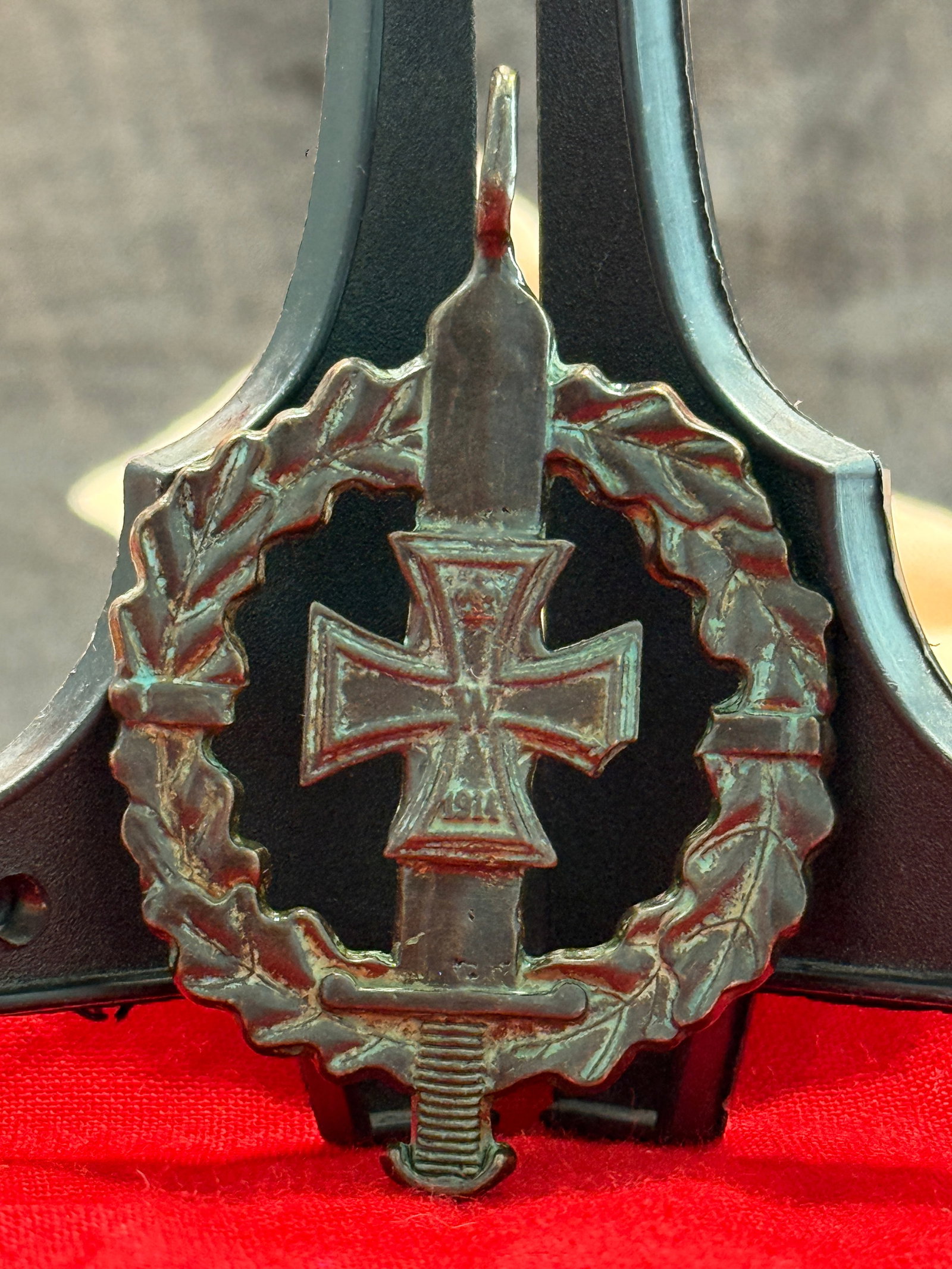 WWII German SA Sports Badge (SA-Sportabzeichen) – Bronze Finish by Gustav Gurschner: This German WWII SA Sports Badge (SA-Sportabzeichen) features the distinctive vertical sword, oak leaf wreath, and central swastika with Iron Cross motif associated with the National Socialist physica