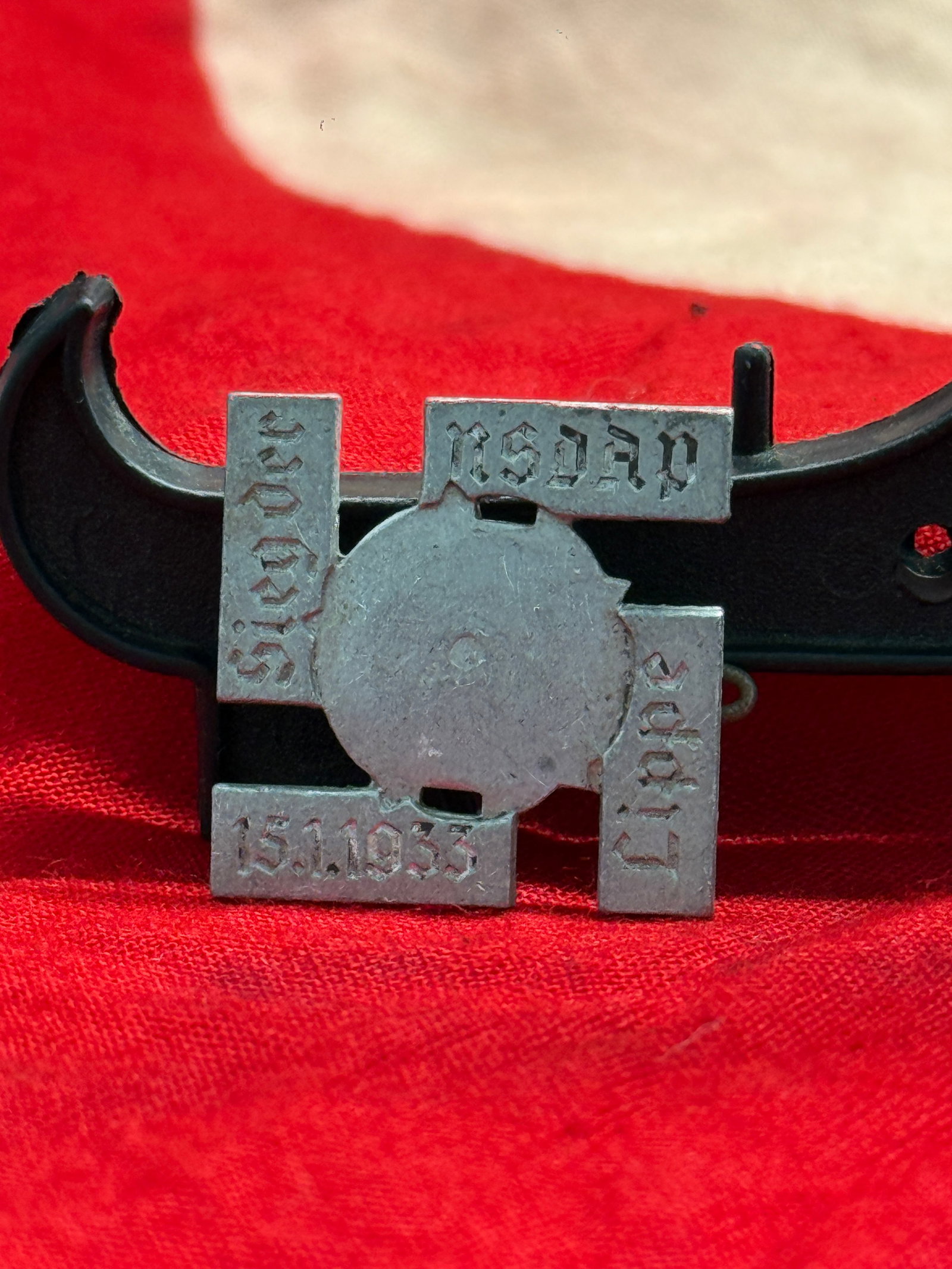 WWII German NSDAP Gau Day Badge – 15.1.1933 “Sieg Heil?? Paulmann & Crone Lüdenscheid: This metal commemorative badge features the inscriptions “NSDAP,” “Sieg Heil,” and the date “15.1.1933,” marking a significant National Socialist Party gathering held during th