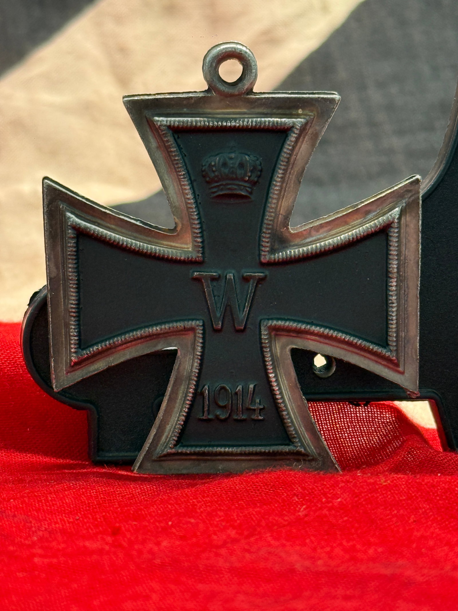 WWI German Iron Cross 2nd Class Medal (1914): This Imperial German Iron Cross 2nd Class features the crowned royal cypher "W" above the date 1914 on the obverse, while the reverse bears the crowned FW cypher with oak leaves above the founding dat
