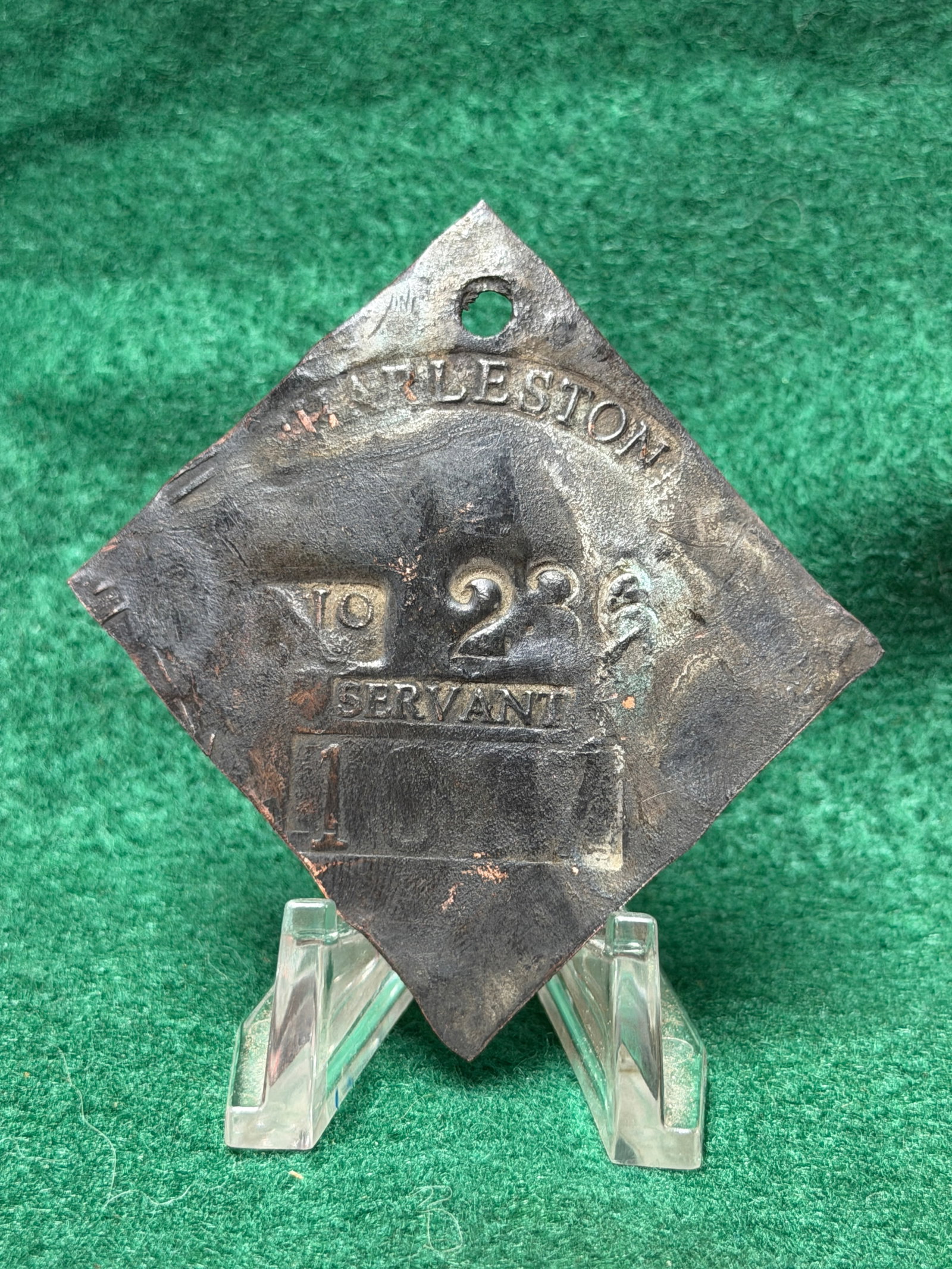 1831 Charleston No. 236 Slave Tag Servant ID: This 1831 Charleston No. 236 Slave Tag Servant ID is a diamond-shaped copper slave hire badge issued by the City of Charleston, South Carolina, bearing the inscriptions "CHARLESTON," "No. 236," "SERVA