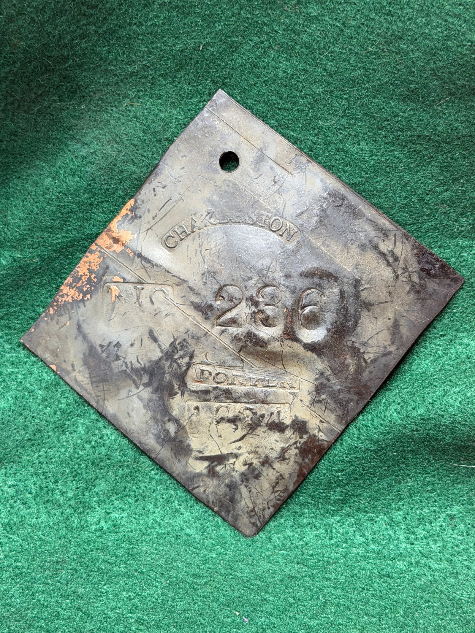 1824 Charleston No. 236 Porter Slave Tag: This 1824 Charleston No. 236 Porter Slave Tag is a diamond-shaped copper slave hire badge issued by the City of Charleston, South Carolina, bearing the stamped inscriptions "CHARLESTON," "236," "PORTE