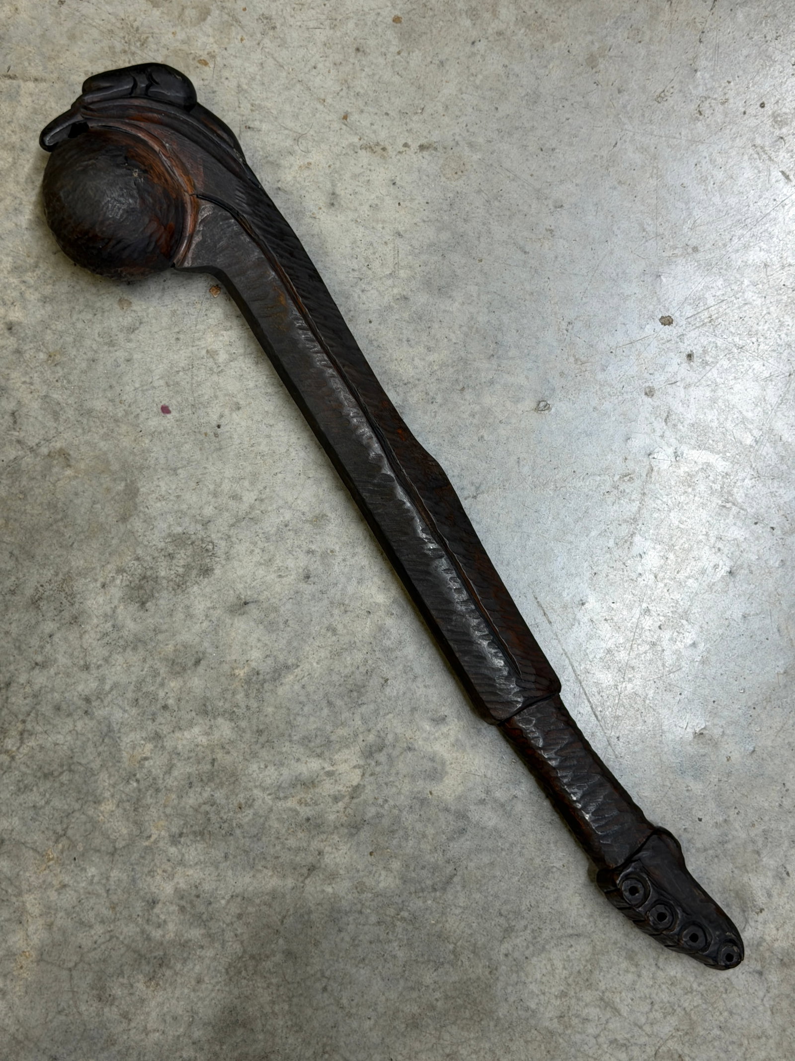 1800’s Native American Ball War Club with Ball in Snake Mouth and Frog on Snake Head Motif: This striking nineteenth-century Native American hardwood ball war club features an intricately hand-carved design incorporating a large spherical striking head emerging from the open mouth of a snake
