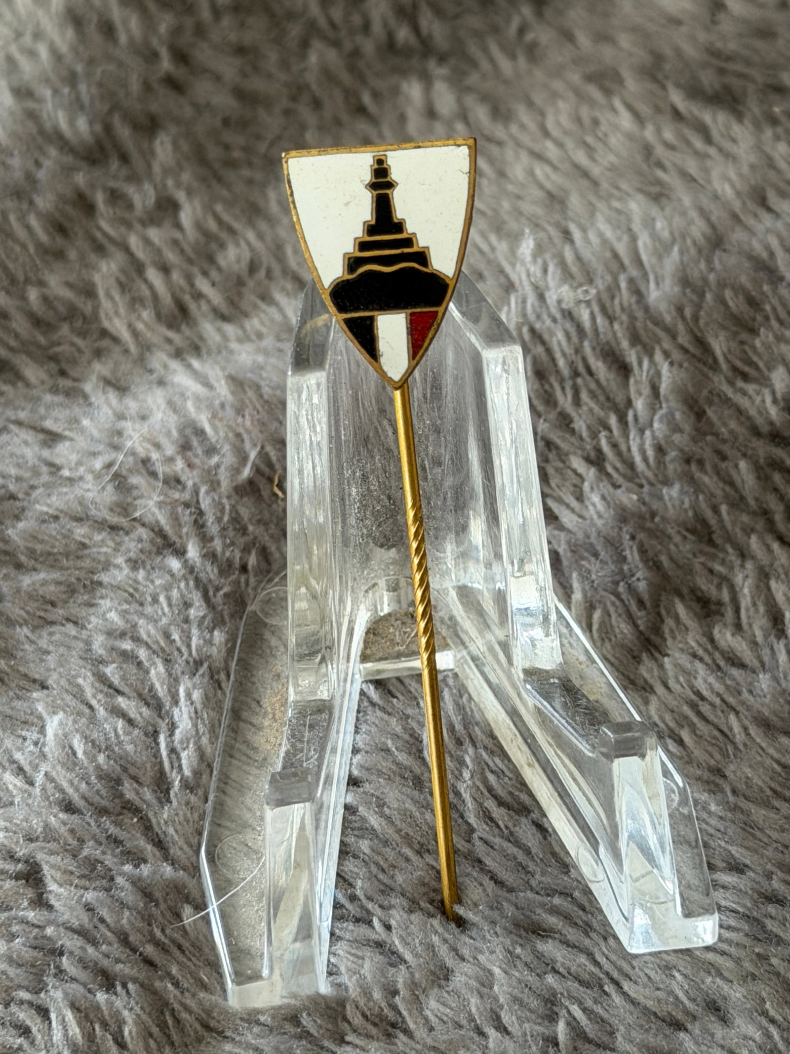 WWII German Kyffhäuser Veterans Association Stickpin: This WWII German Kyffhäuser Veterans Association Stickpin features a white enameled shield bearing the silhouette of the Kyffhäuser Monument above the black, white, and red Imperial German national 