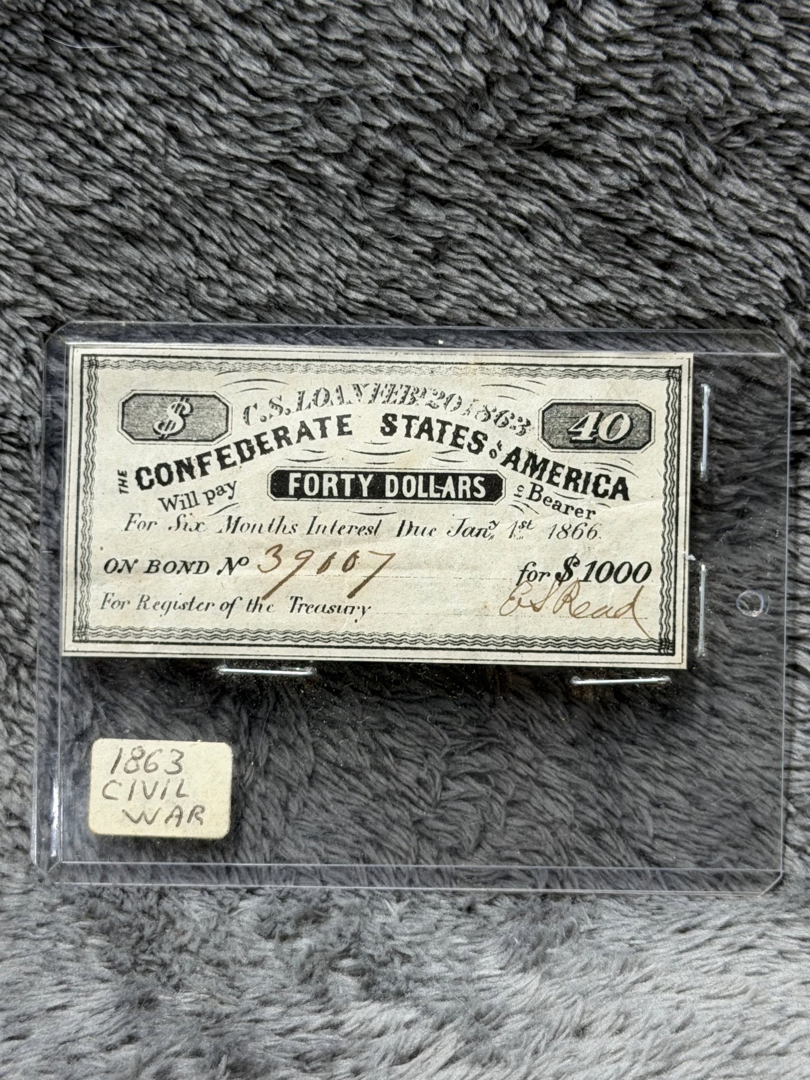 Civil War Confederate States of America 1863 $40 Bond Interest Coupon Note: This Civil War Confederate States of America $40 bond interest coupon note is dated C.S. Loan February 20, 1863 and represents a semiannual interest payment issued on a $1,000 Confederate government b