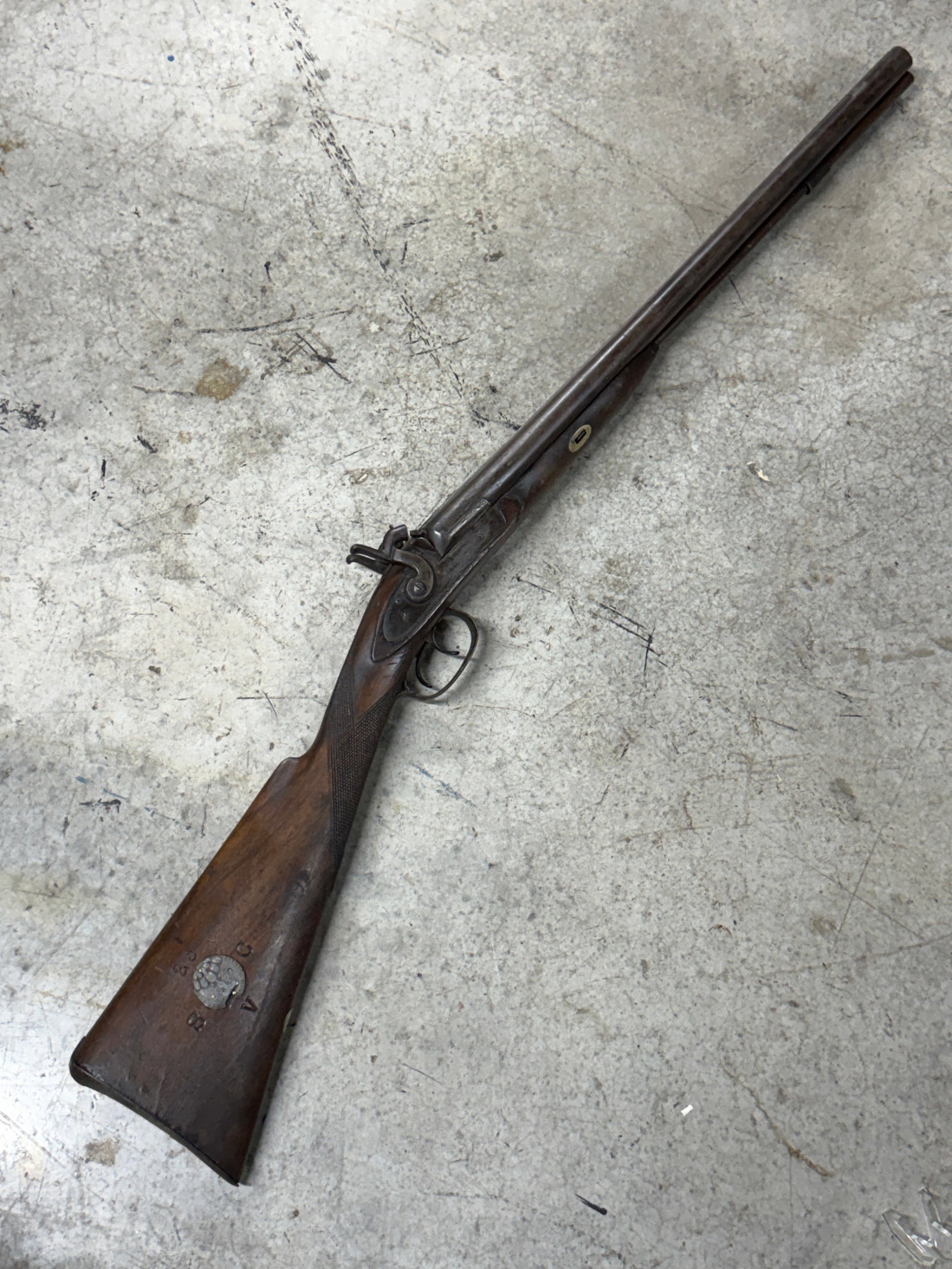 Civil War Confederate CSA Double Barrel Percussion Shotgun of the 25th South Carolina Volunteers: This Civil War Confederate double barrel percussion shotgun is associated with the 25th South Carolina Volunteer Infantry, a regiment that served in the Confederate Army during the American Civil War.