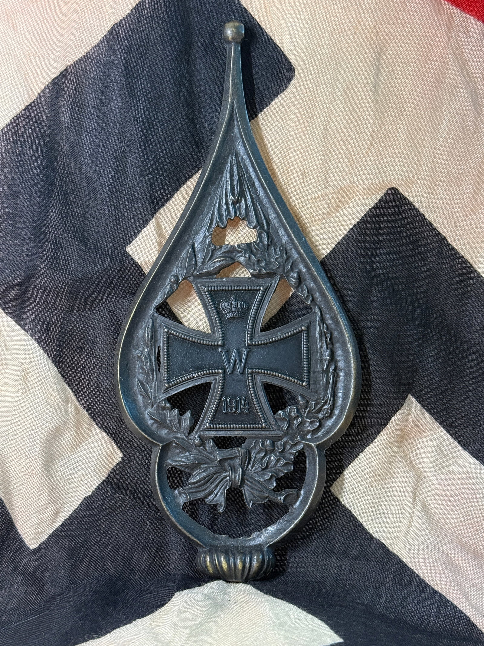WWI German Iron Cross 1914 Flagpole Finial (Fahnenspitze): This decorative German Imperial flagpole finial (Fahnenspitze) features an openwork spearhead design surrounding the 1914 Iron Cross with the crowned "W" monogram of Kaiser Wilhelm II above the date "