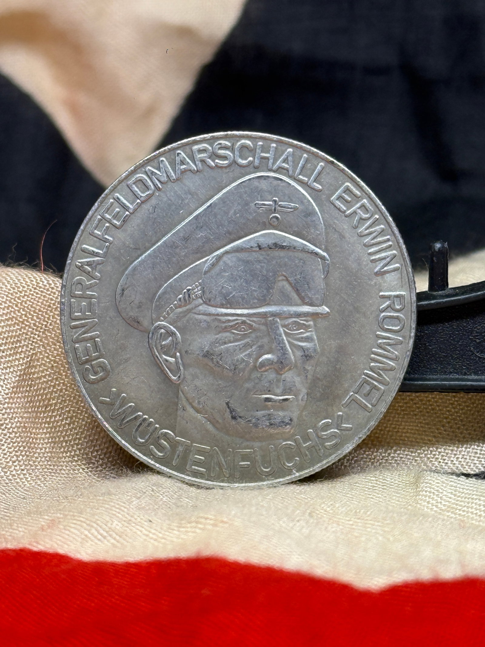 WWII German Generalfeldmarschall Erwin Rommel Commemorative Medal: This large commemorative medal honors Generalfeldmarschall Erwin Rommel, one of Germany's most renowned military commanders of the Second World War. The obverse features a detailed portrait of Rommel 