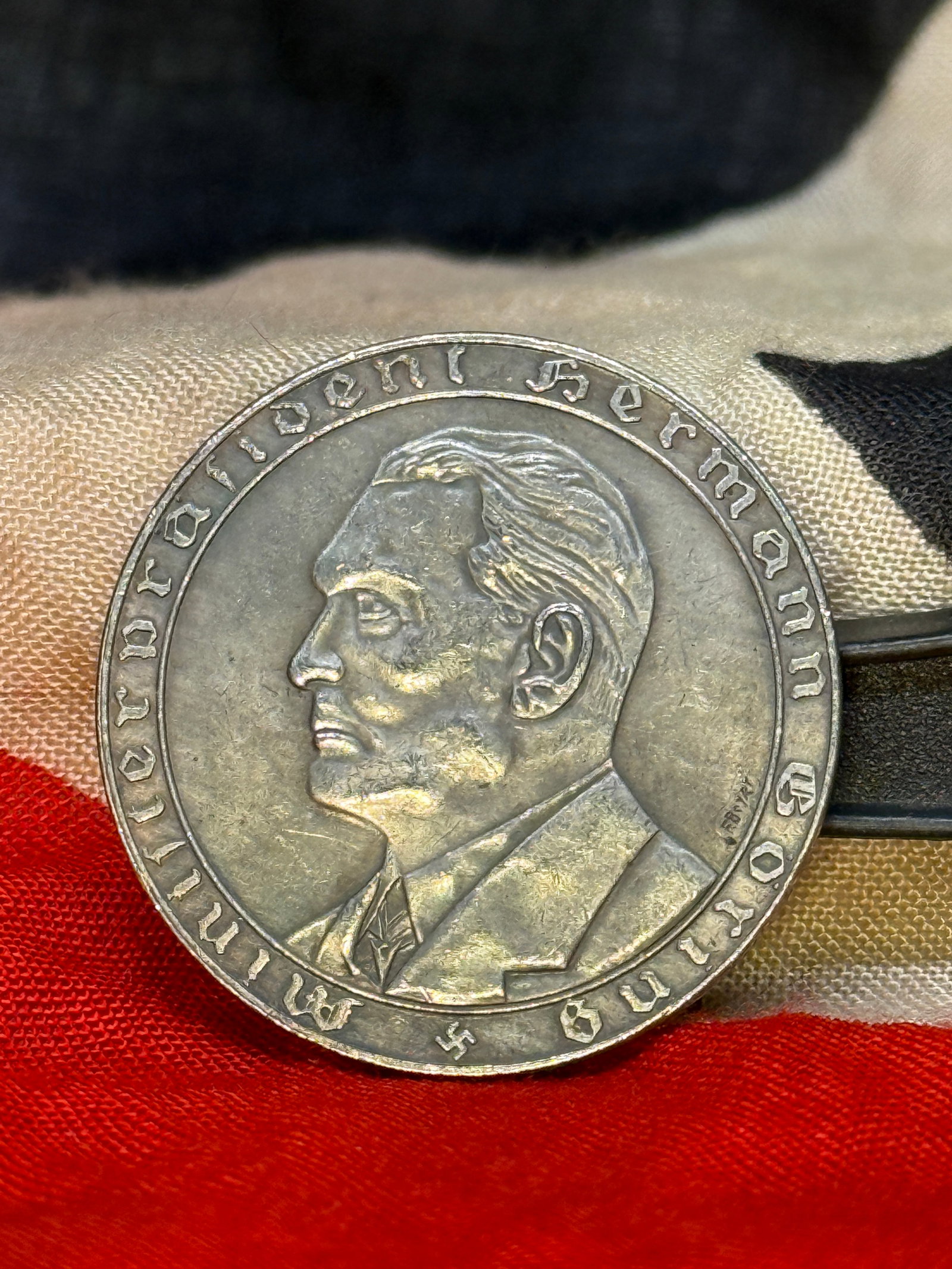 1933 Hermann Göring Prussian Minister-President Commemorative Medal: A circular silver-colored commemorative medal honoring Hermann Göring following his appointment as Minister-President of Prussia. The obverse bears a left-facing portrait of Göring in civilian dress