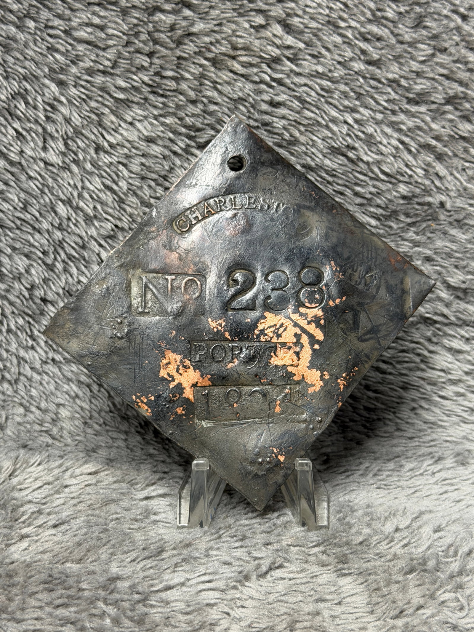 Charleston 1824 No. 238 Porter Slave Hire Tag Enslaved Labor Badge: Offered here is a Charleston slave hire tag dated 1824 and marked “CHARLESTON” across the upper portion, “No. 238” prominently in the center, and “PORTER” below. These numbered