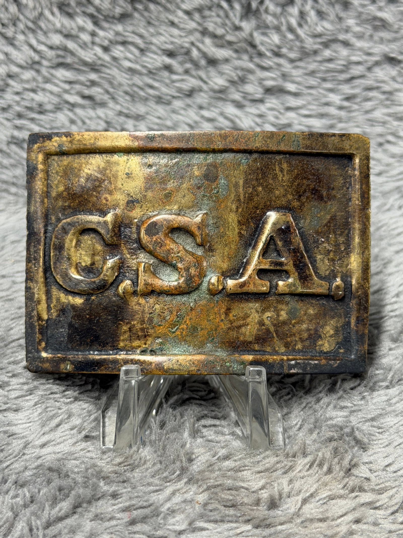 C.S.A. Confederate States of America Brass Belt Buckle Civil War Style 3-Prong: Rectangular brass-toned C.S.A. belt buckle featuring large raised “C.S.A.” lettering across the front with a raised border around the perimeter. The reverse has three projecting attachment hoo