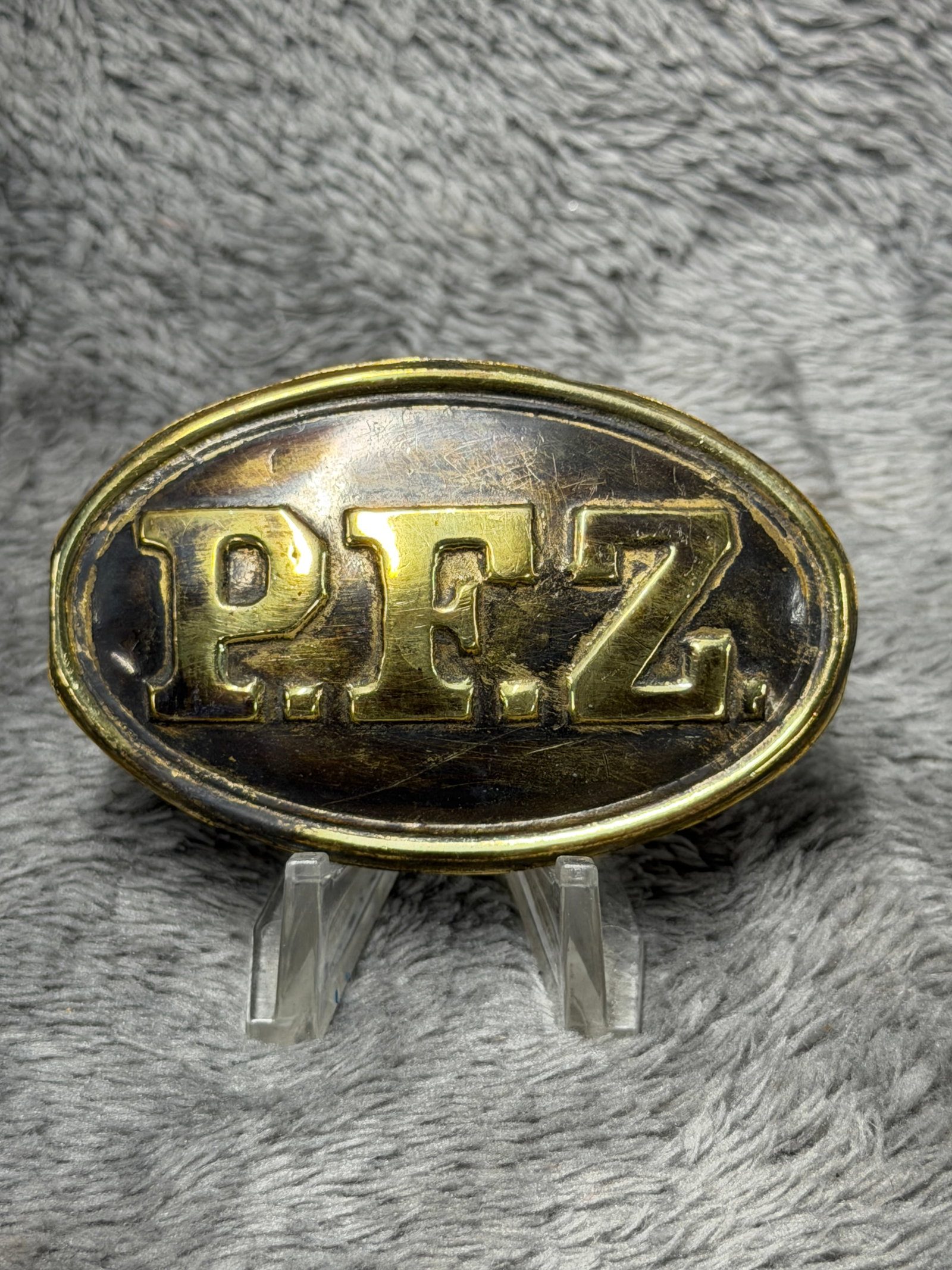 Civil War-era Philadelphia Fire Zouave “P.F.Z.?? oval brass belt plate: Civil War-era Philadelphia Fire Zouave “P.F.Z.” oval brass belt plate, identified by the old collection label on the reverse as associated with the 72nd Pennsylvania Infantry. The face feature