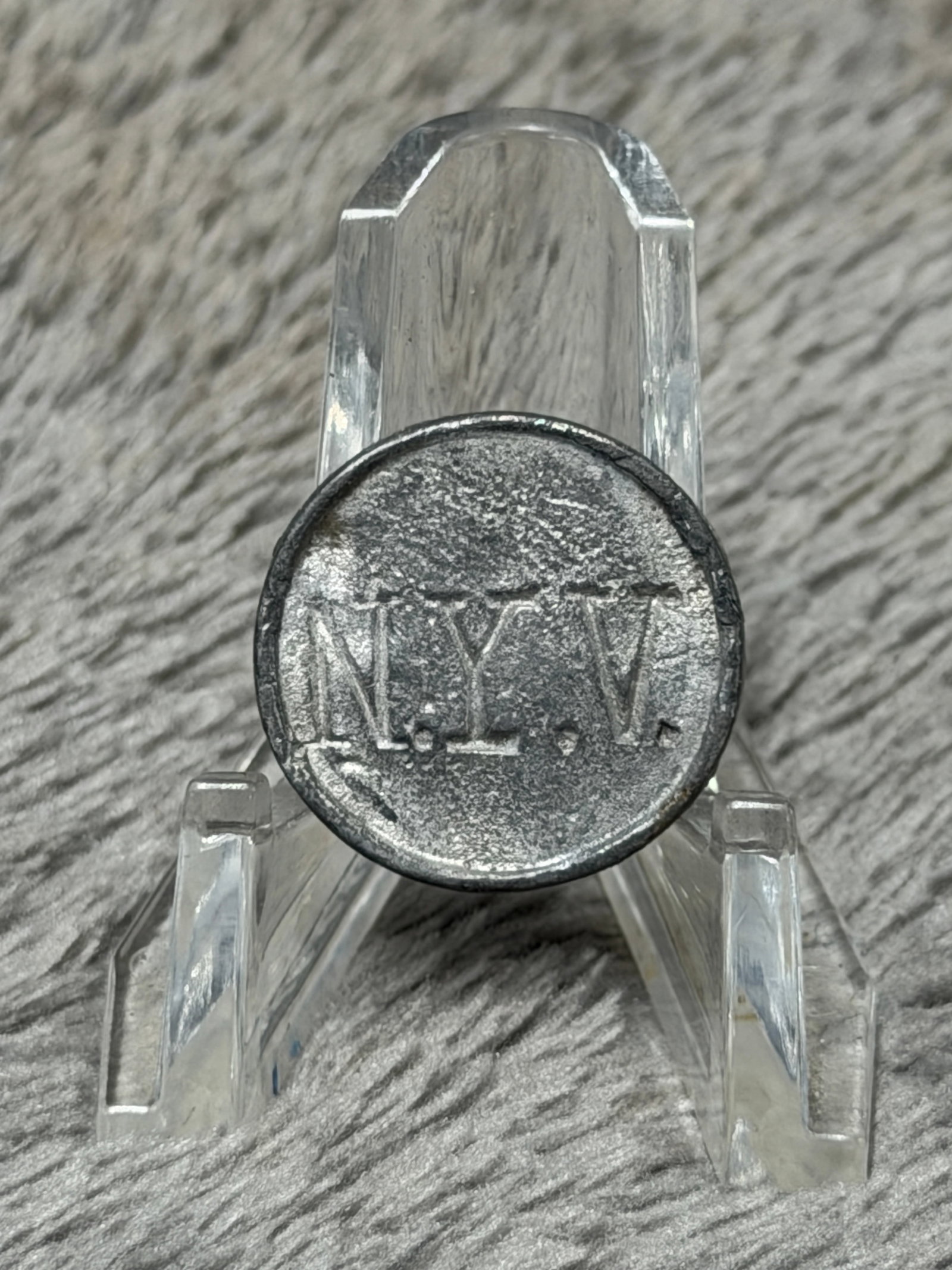 Revolutionary War New York Volunteers N.Y.V. Pewter Coat Button – Original Military Relic: Offered is a Revolutionary War era New York Volunteers pewter coat button featuring the large raised initials “N.Y.V.” across the face. The button is of one-piece round pewter construction wit