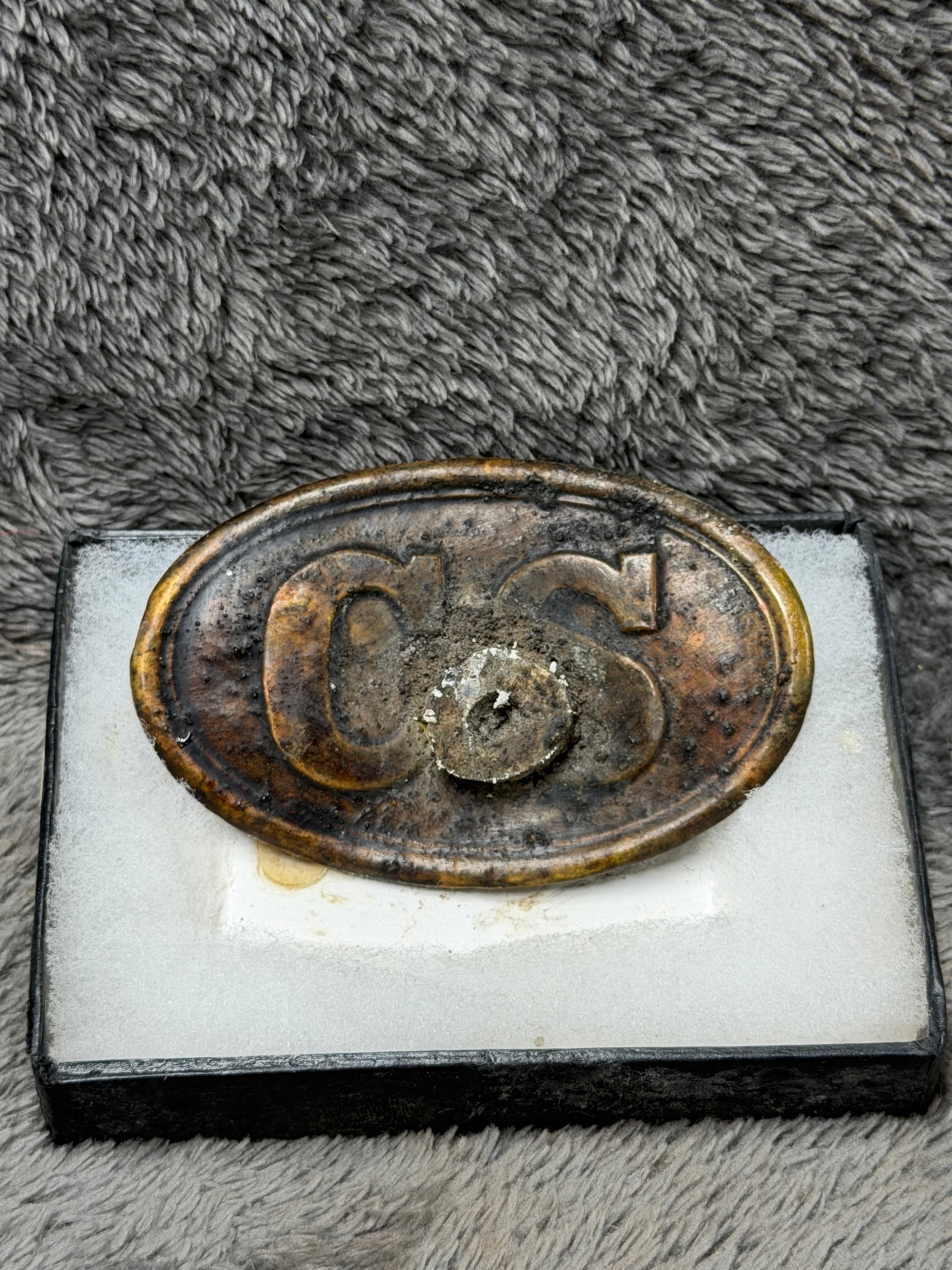 Civil War Confederate CS Bullet-Struck “Miracle?? Belt Buckle – Battlefield Relic: Offered is a Civil War era Confederate-style oval CS belt buckle featuring large raised “CS” lettering on the face. The buckle has a pronounced impact to the center, consistent in appearance w