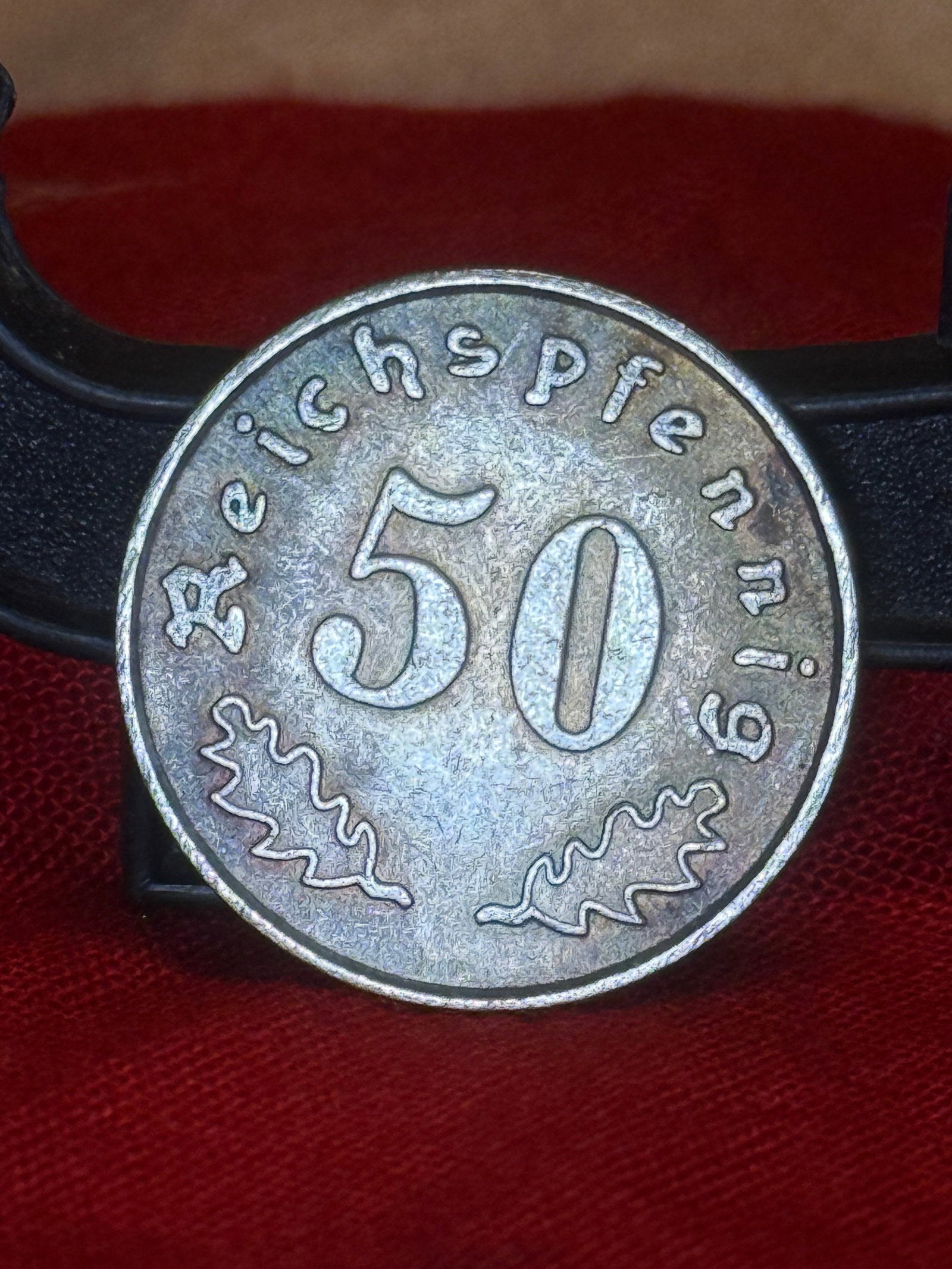 WWII German Waffen-SS 1940 Kantinengeld 50 Reichspfennig Canteen Token: WWII German round metal canteen token marked “Kantinengeld” with the SS runes prominently displayed in the center and the date “1940” below. The opposite side is marked “50 Reichspfe