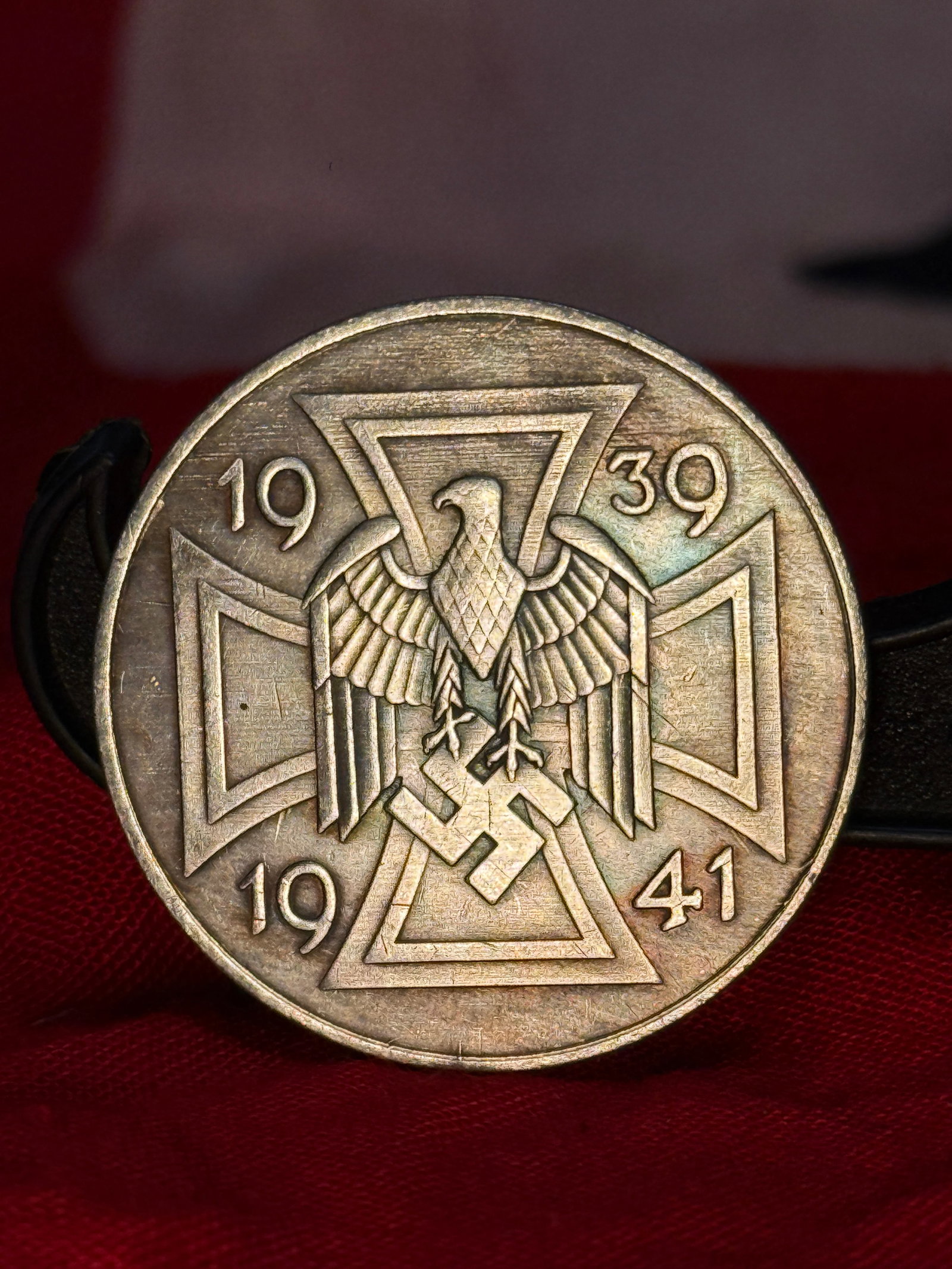 WWII German "Den Kämpfern für die Deutsche Freiheit" Commemorative Medal: This German commemorative medal features an eagle superimposed over an Iron Cross with the dates 1939 and 1941 on the obverse. The reverse bears the inscription "Den Kämpfern für die Deutsche Freihe