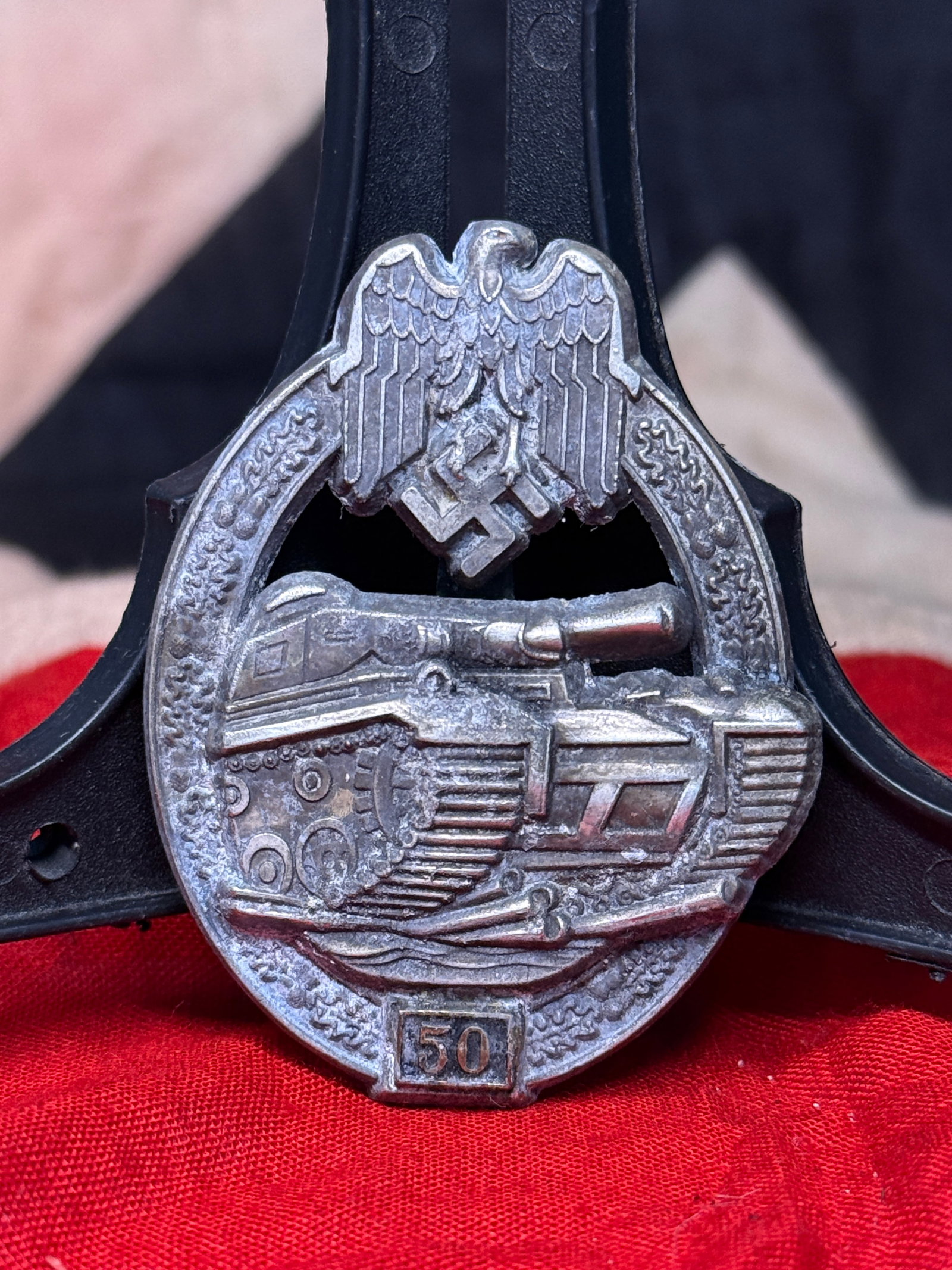 WWII German Panzer Assault Badge with 50 Engagements By JFS: The Panzer Assault Badge with "50" engagement designation was awarded to German armored vehicle personnel who participated in numerous combat actions during the Second World War. Featuring the Wehrmac