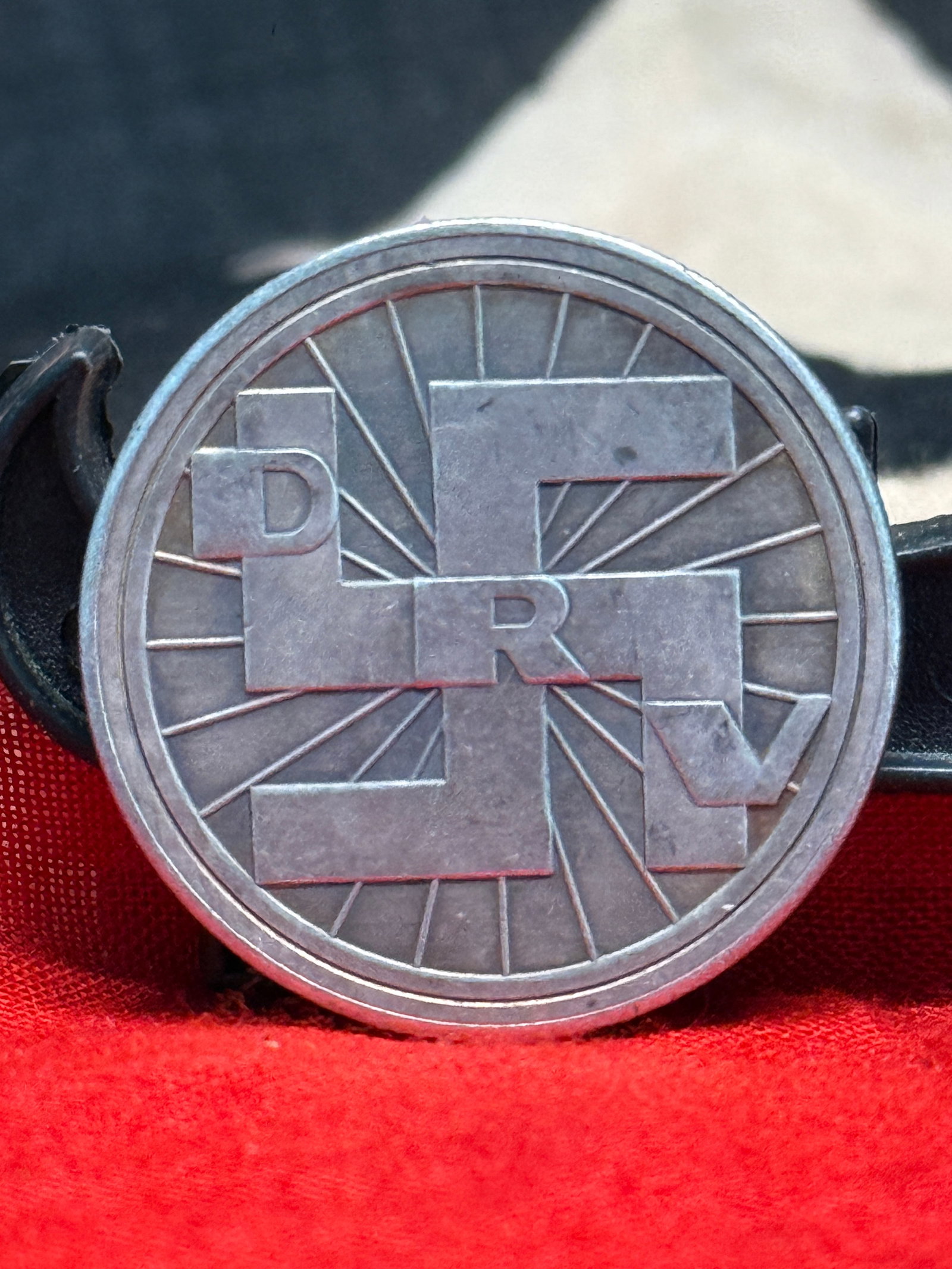 1936 German Olympic Commemorative Medal – Deutscher Luftsportverband (DLRV): This commemorative medal features the intertwined "DLRV" monogram on the obverse and the reverse inscription "Olympiade-Erinnerungs-Medaille 1936" above the Olympic rings and laurel branch. The initia