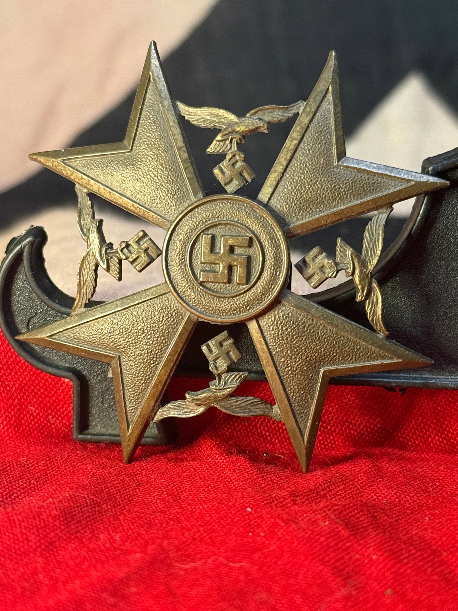WWII German Spanish Cross in Bronze Without Swords: This Spanish Cross in Bronze Without Swords features the distinctive eight-pointed cross with four German national eagles positioned between the arms and a central swastika medallion. The Bronze Witho