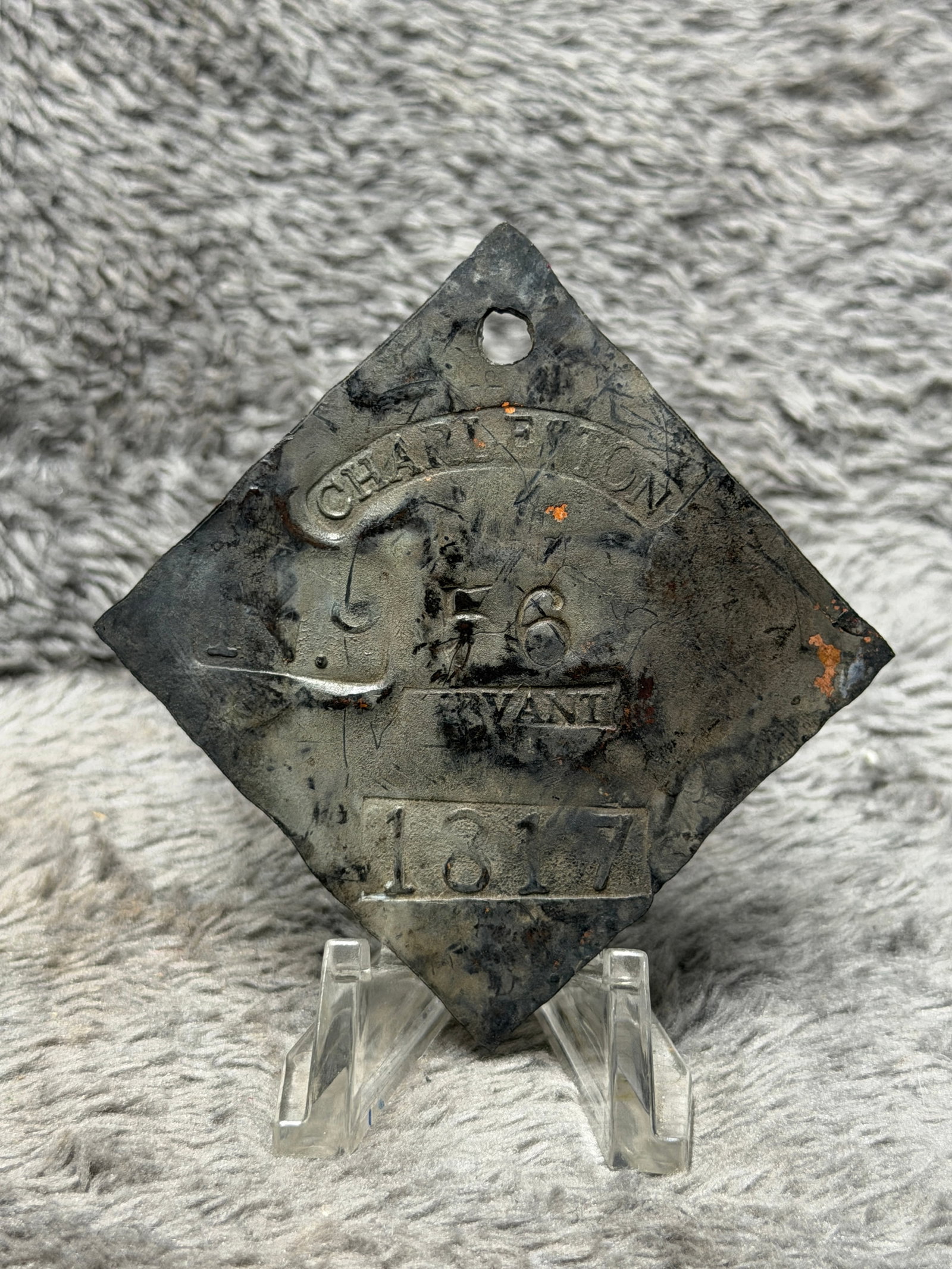 Dated 1817 Charleston Slave Tag No. 56 Servant Enslaved Hire Identification Badge: Diamond-shaped Charleston slave hire tag bearing the curved “CHARLESTON” marking across the upper portion, identification number “56” at center, “SERVANT” occupational designat