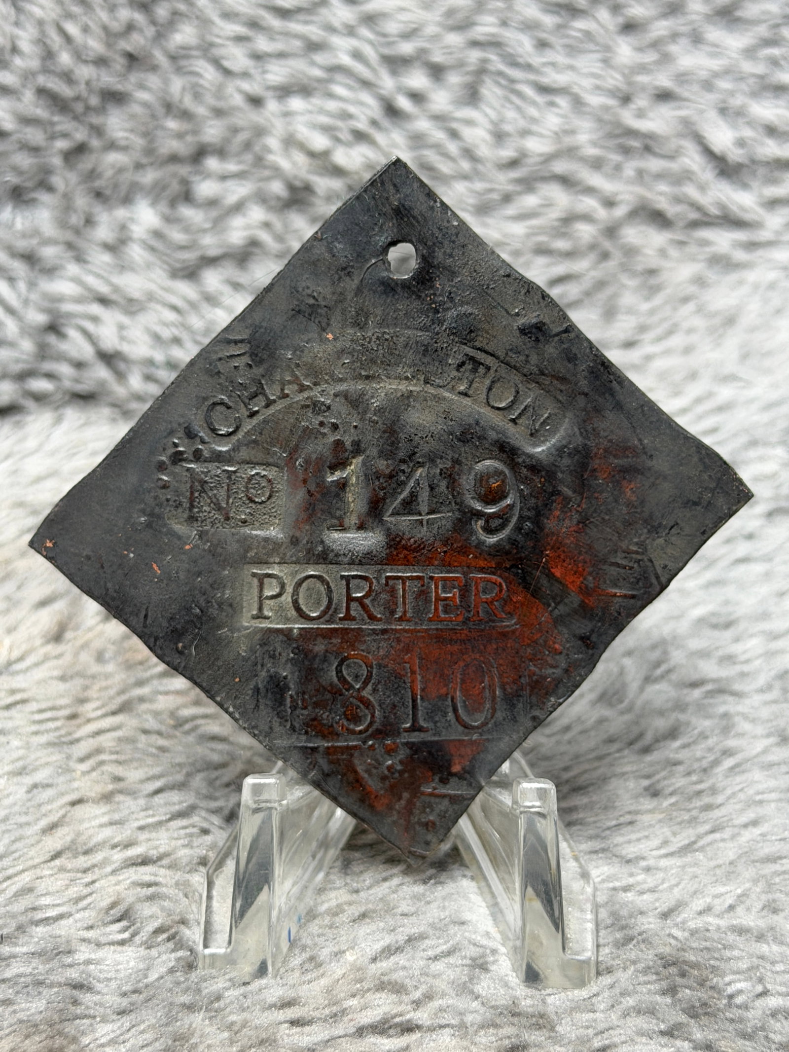 Dated 1810 Charleston Slave Tag No. 149 Porter Enslaved Hire Identification Badge: Diamond-shaped Charleston slave hire tag marked “CHARLESTON” in a curved banner across the upper portion, with “No 149” prominently stamped at center, the occupational designation “P
