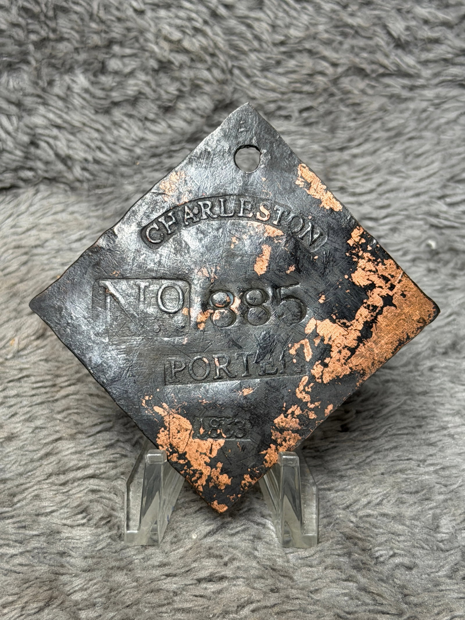 Dated 1833 Charleston Slave Tag No. 885 Porter Enslaved Hire Identification Badge: Diamond-shaped Charleston slave hire tag marked “CHARLESTON” in a curved banner across the upper portion, with “No 885” stamped prominently at center, the occupational designation “P