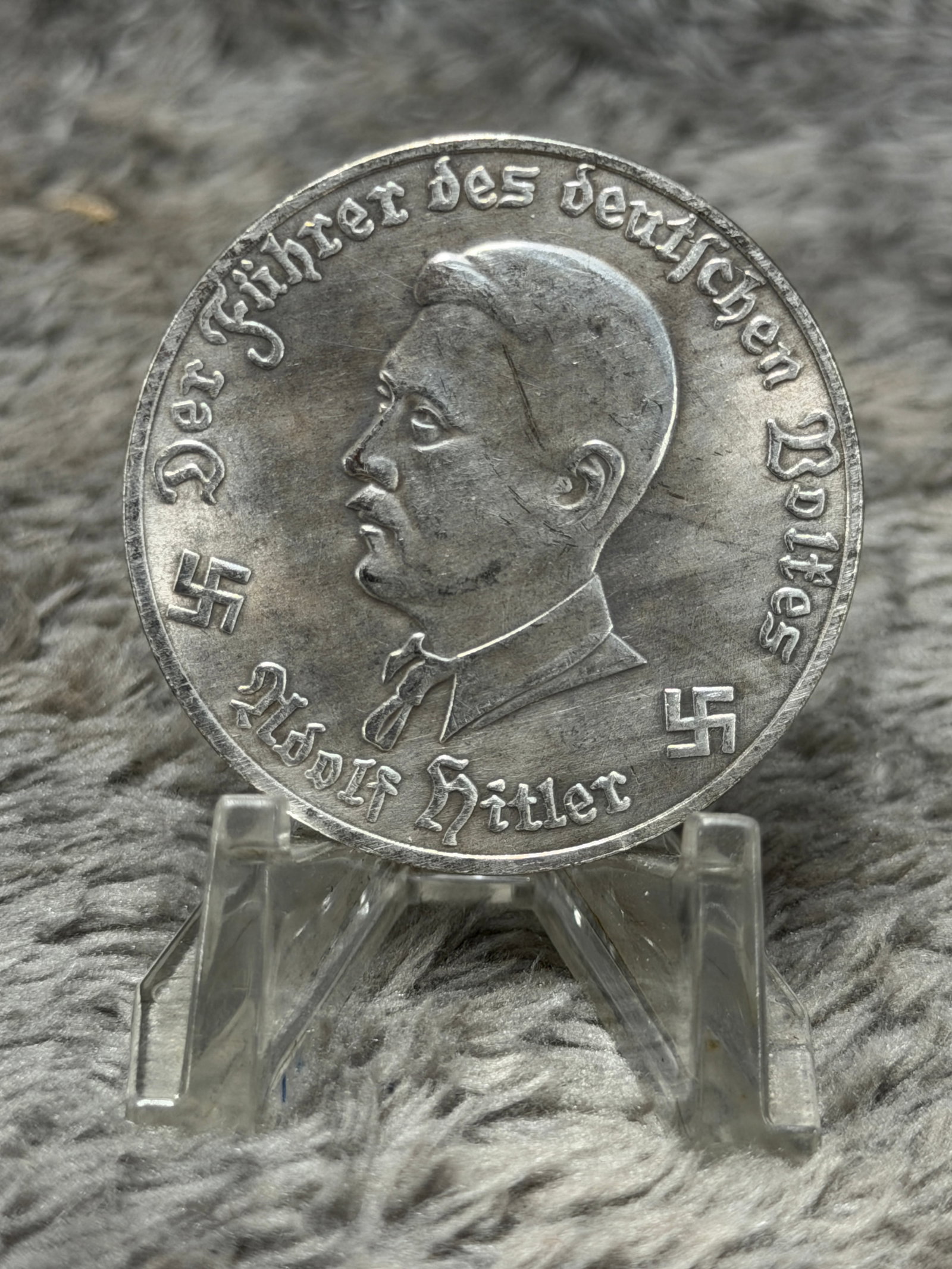 WWII German Adolf Hitler “Führer des Deutschen Volkes?? 1943 Luftwaffe Aircraft 10 Mark: A large WWII German commemorative medallion featuring a raised left-facing portrait of Adolf Hitler surrounded by the Gothic inscription “Der Führer des deutschen Volkes,” with “Adolf Hitle