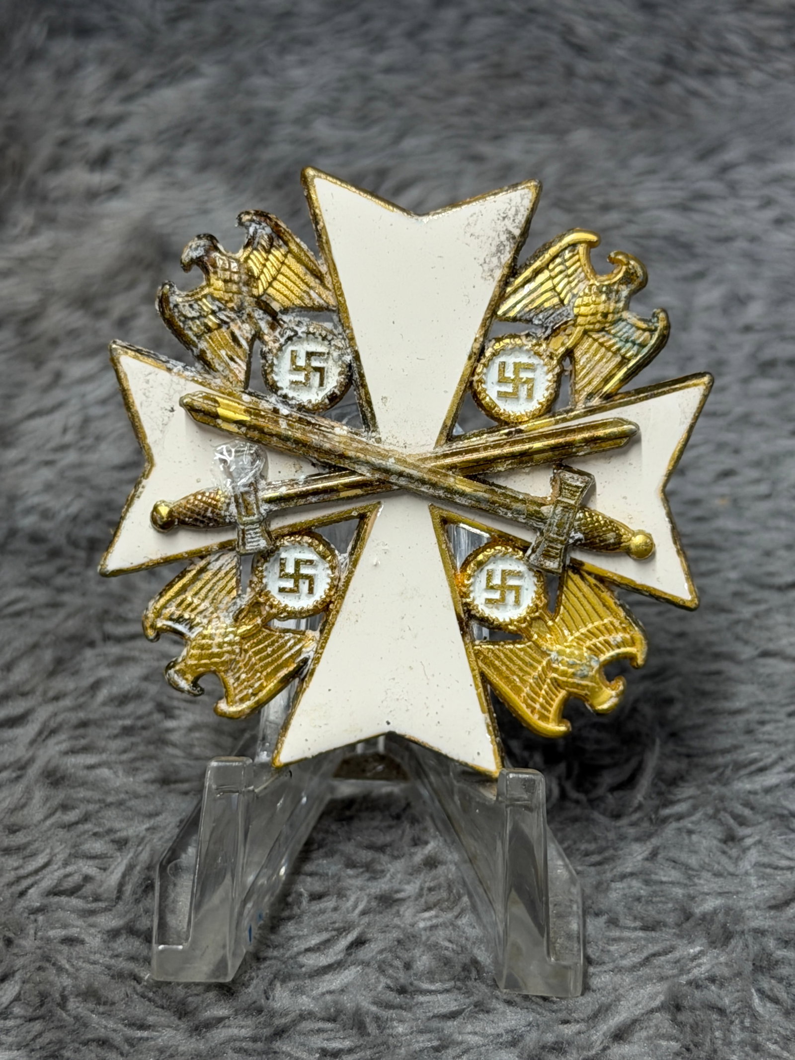 WWII German Third Reich Crossed Swords & Eagles White Enamel Breast Star Badge – Marked “900: Striking WWII German Third Reich breast decoration featuring a large white enameled multi-point cross overlaid with an elaborate arrangement of crossed swords and four gilt German eagles, each eagle c