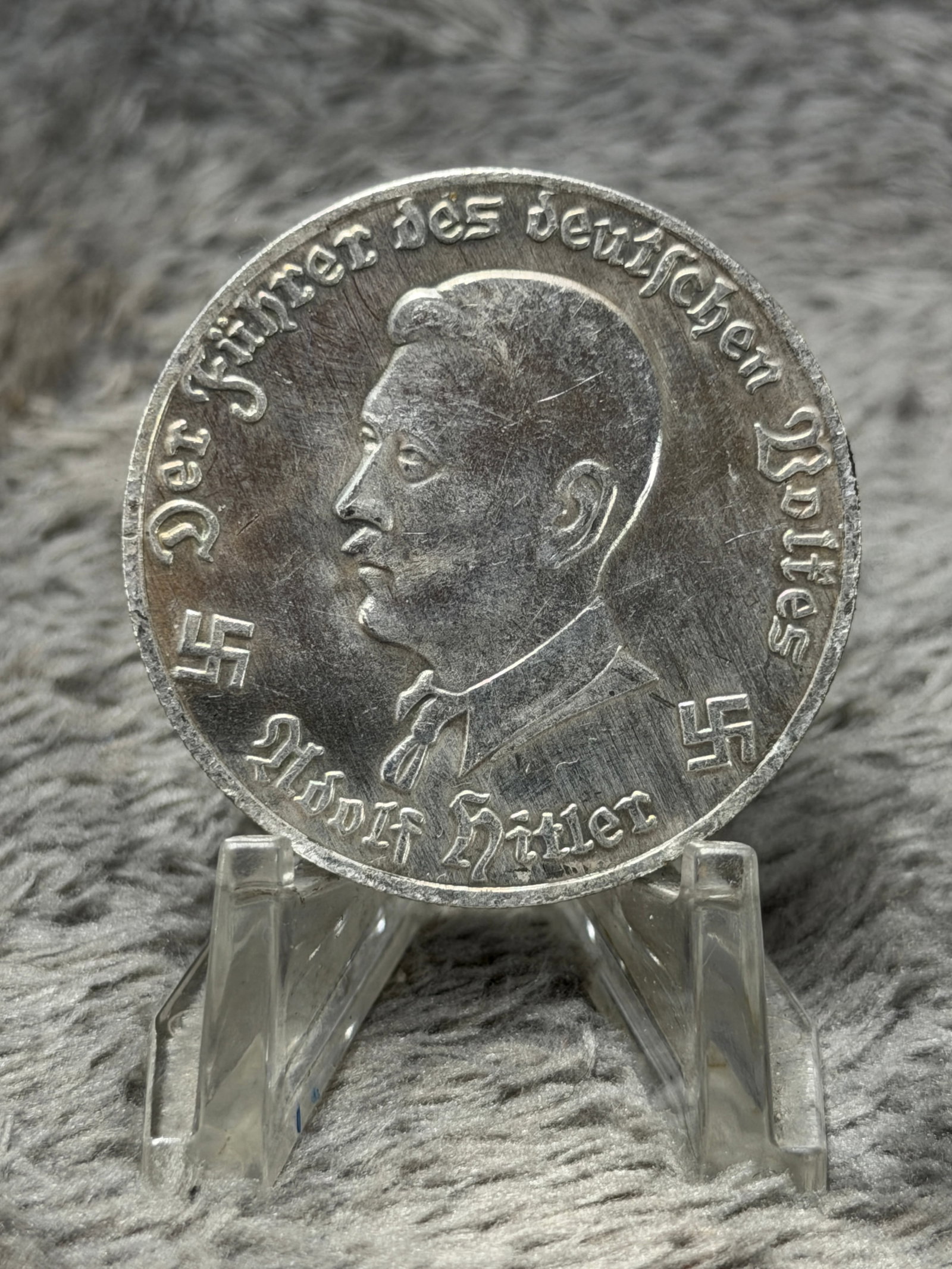 WWII German Adolf Hitler “Führer des Deutschen Volkes?? 1944 V-1 Flying Bomb Commemorative Medal: Unusual WWII German commemorative medal featuring a left-facing portrait of Adolf Hitler in military dress, surrounded by the raised Gothic inscription “Der Führer des Deutschen Volkes,” with
