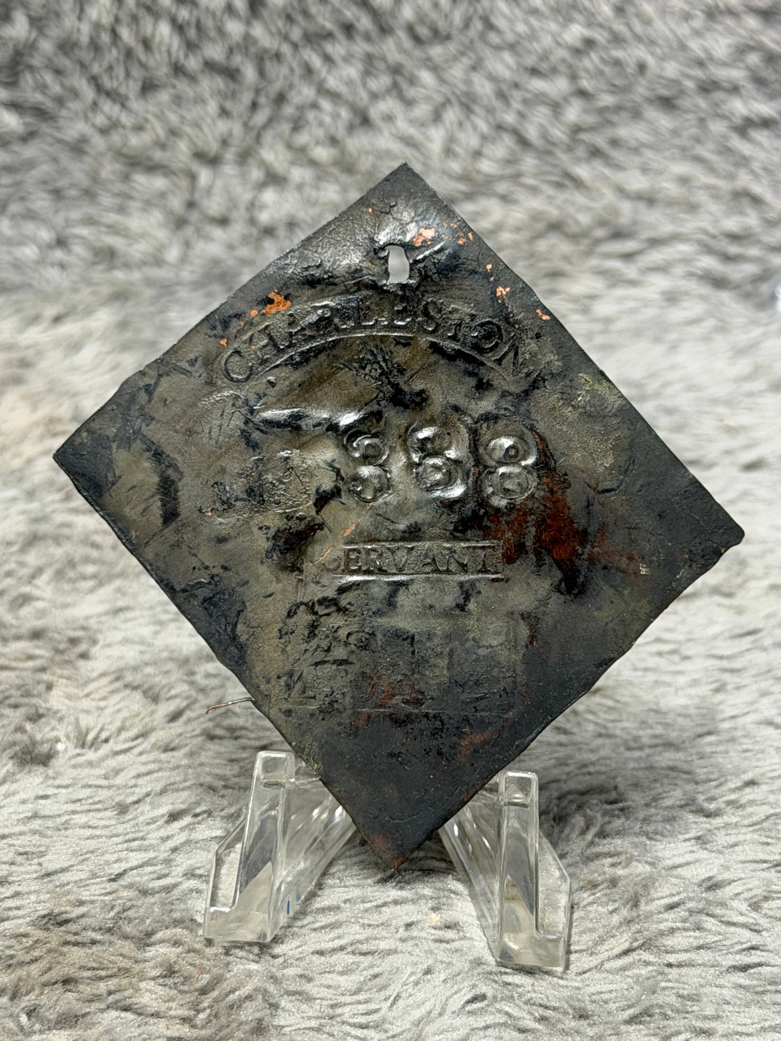 1819 Charleston South Carolina Slave Hire Tag No. 388 – “SERVANT: Historically significant 1819 Charleston, South Carolina slave hire tag bearing the prominently impressed identification number “388” with the occupational designation “SERVANT” stampe