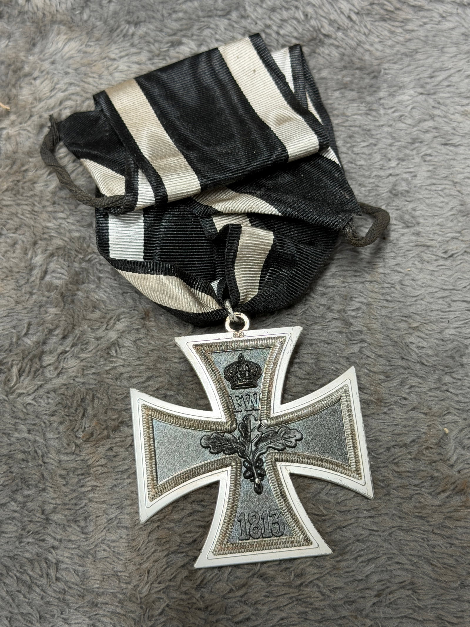 WWI Imperial German 1914 Iron Cross 2nd Class Medal with Black & White Ribbon: Impressive WWI Imperial German Iron Cross 2nd Class featuring the classic flared-arm cross form suspended from a broad black and white ribbon. The obverse displays the Imperial crown above the crowned