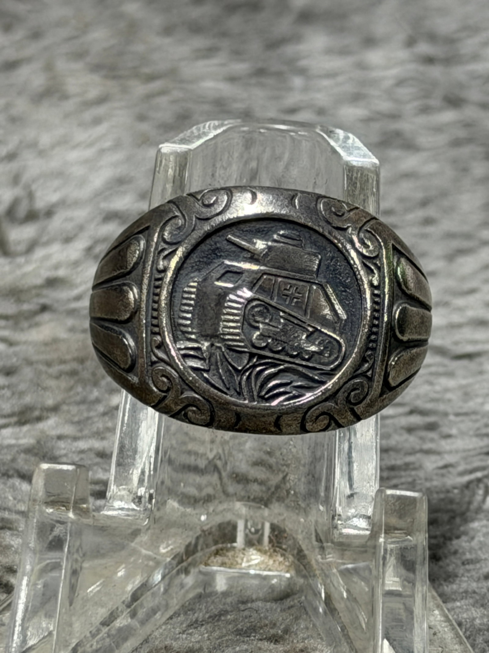 WWII German Waffen-SS Panzer Division “Das Reich?? Tank Soldier Silver Ring – SD Nord 1943: WWII German Waffen-SS Panzer-themed finger ring featuring a heavily detailed raised depiction of a tracked armored vehicle or tank on the face, complete with turret, cannon, road wheels and a swastika