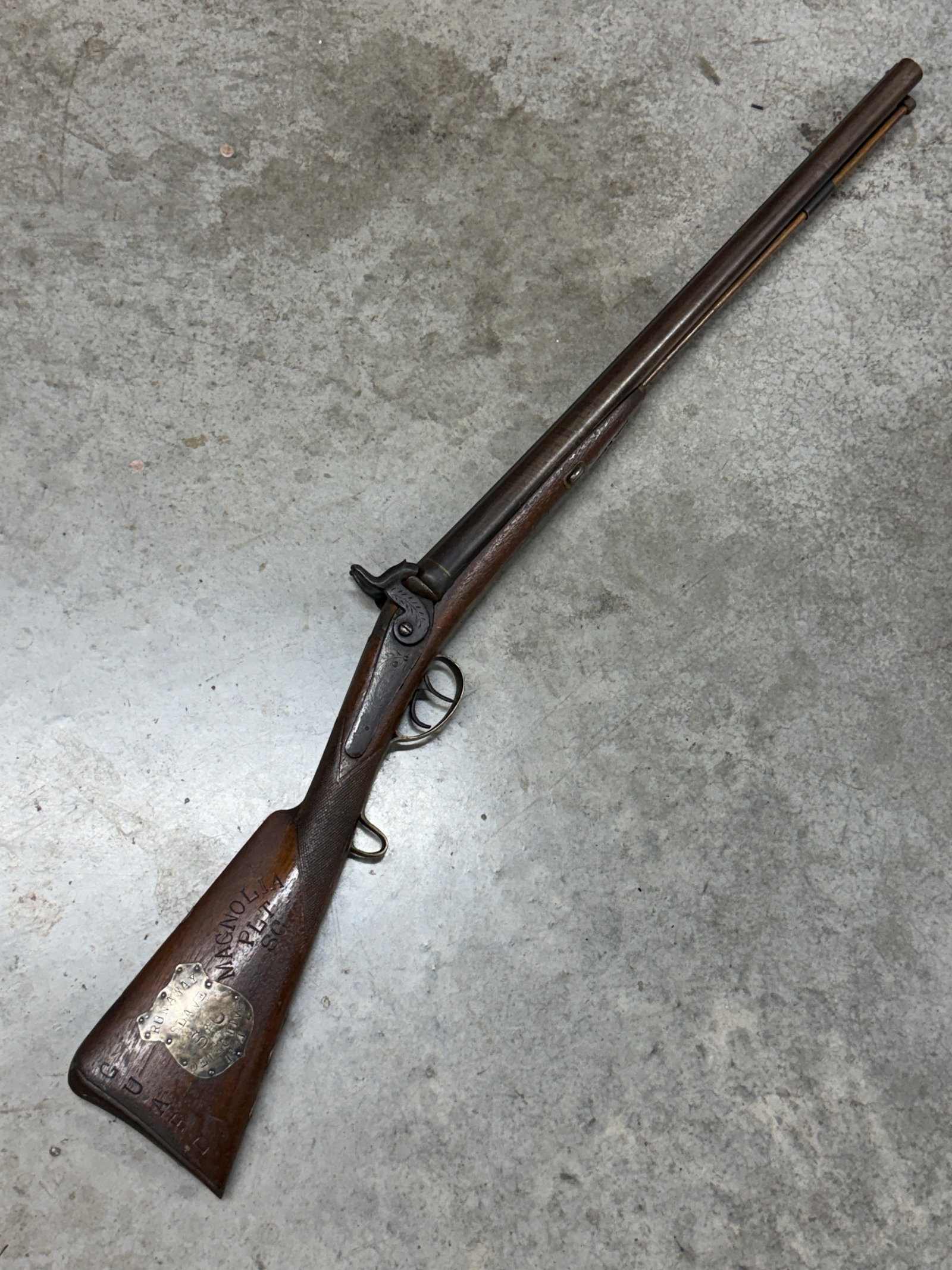 Civil War Confederate South Carolina Double Barrel Percussion Rifle “Runaway Slave Detective: Remarkable Civil War period double-barrel percussion long gun featuring extensive hand-cut markings and a large shield-shaped metal plaque mounted to the buttstock. The plaque is prominently engraved 