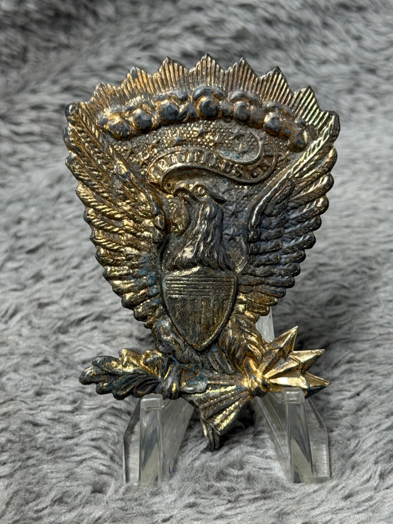 Civil War Union U.S. Army Eagle “E Pluribus Unum?? Shako Hat Plate: Impressive Civil War-era Union U.S. Army eagle headgear plate featuring a highly detailed spread-wing American eagle beneath a radiating crest, with the national shield prominently displayed upon its 