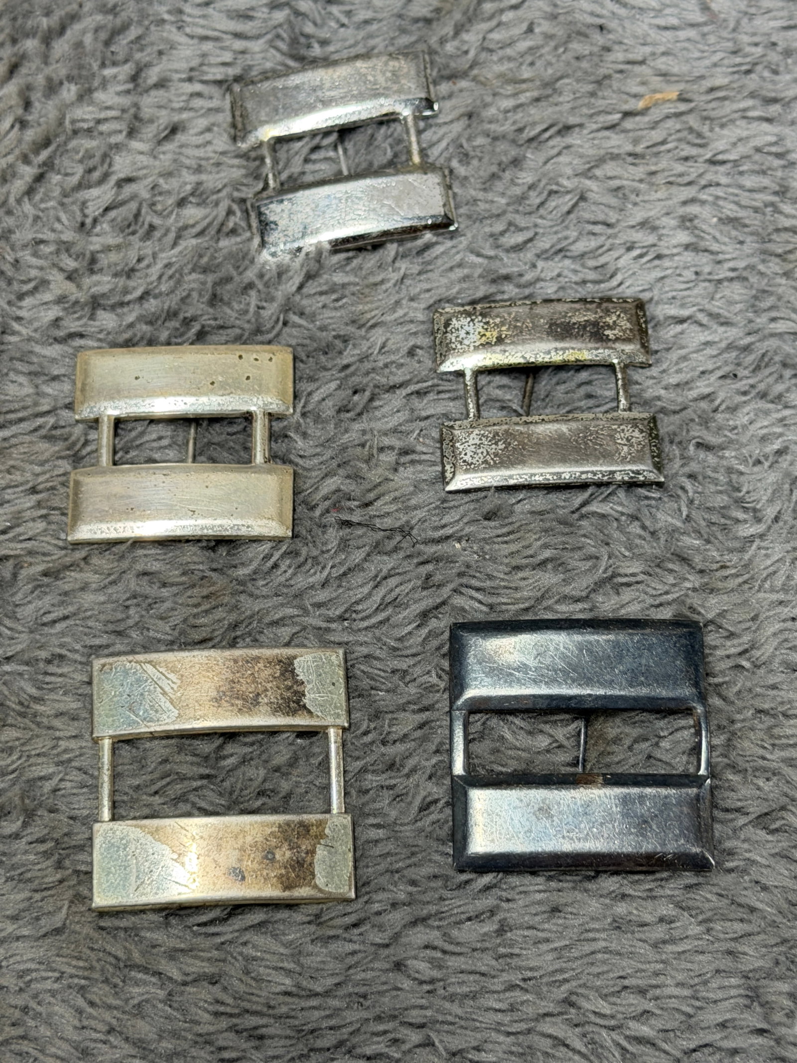 WWII U.S. Army Officer Sterling Silver Rank Insignia Bar Collection – Set of Five: WWII-era grouping of five U.S. Army officer rank insignia devices, each constructed in the familiar double-bar configuration associated with the rank of Captain. The group includes several variations 