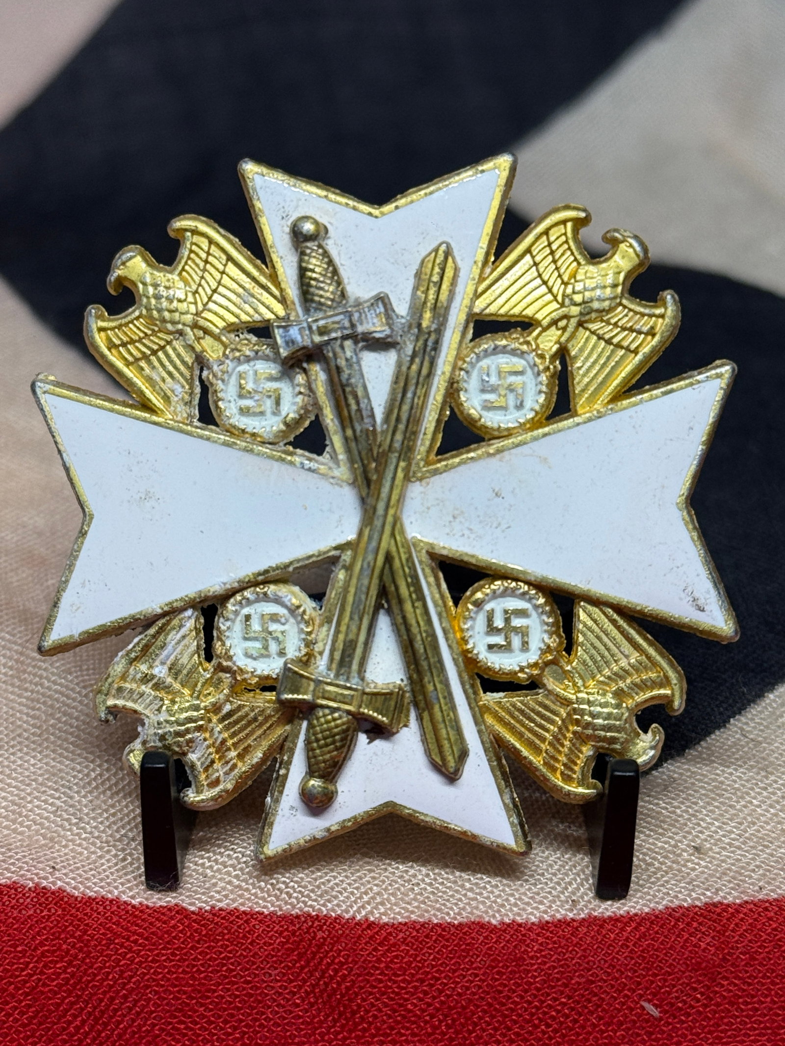 WWII German Order of the German Eagle 2nd Class with Swords – 900 Silver Marked: This elaborate WWII-era German decoration is identified as an Order of the German Eagle, 2nd Class with Swords, a grade of the diplomatic order established during the Third Reich and principally assoc