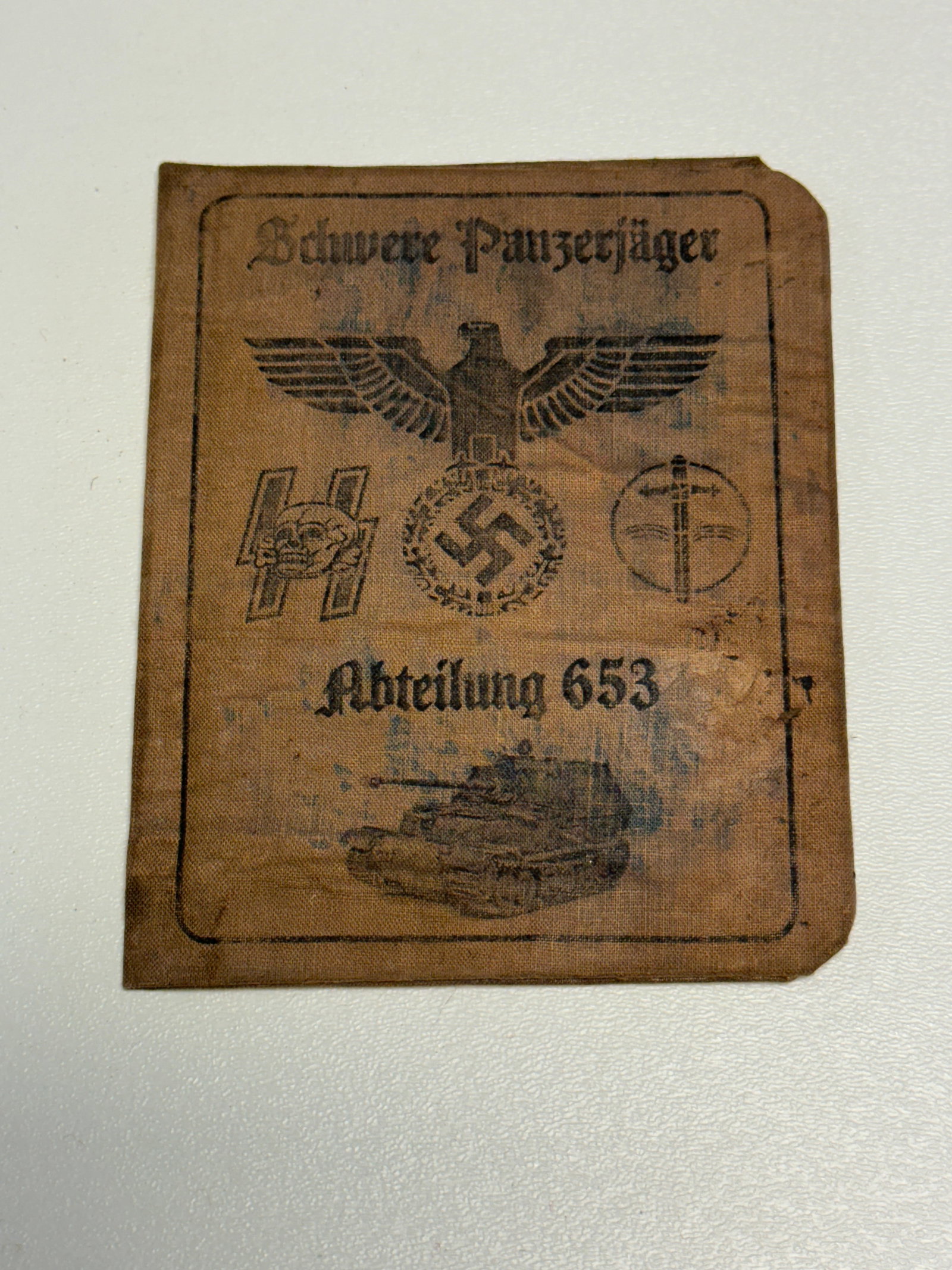 WWII German Waffen-SS Schwere Panzerjäger Abteilung 653 Soldier Identification Booklet: WWII German military identification booklet associated with Schwere Panzerjäger Abteilung 653, the heavy tank-destroyer battalion historically associated with German heavy Panzerjäger vehicles. The 