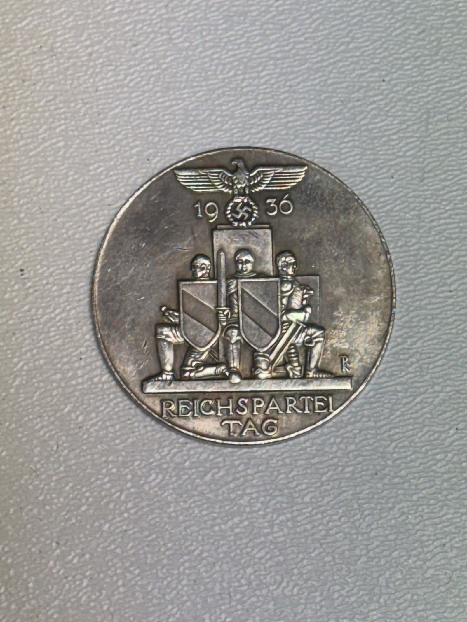 WWII German 1936 Nürnberg Reichsparteitag Nuremberg Rally Medal: WWII German commemorative medal for the 1936 Reichsparteitag held at Nürnberg (Nuremberg), featuring a finely detailed raised design with a German eagle and swastika above the date “1936,” th
