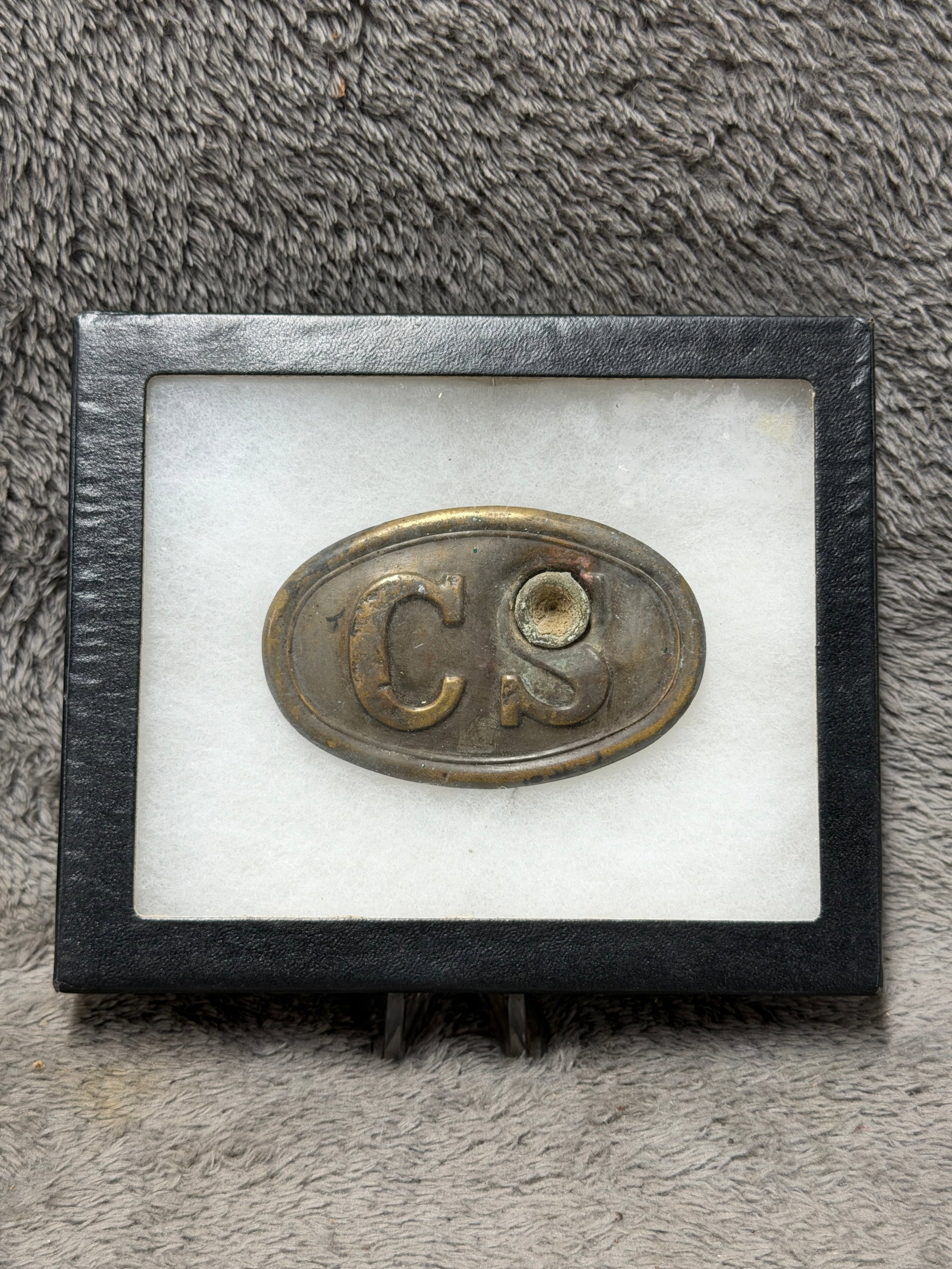 Civil War Confederate CSA Bullet Struck “Miracle?? CS Belt Buckle: Remarkable Civil War Confederate CSA oval belt buckle featuring large raised “CS” lettering within a double-bordered face and a dramatic bullet strike directly through the upper portion of the