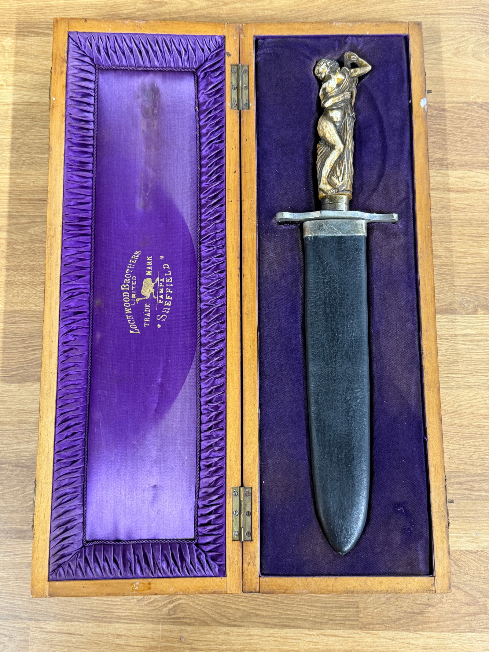 1800s Lockwood Brothers Sheffield “Pampa?? Bowie Knife with Figural Lady Handle, Sheath &: Striking 1800s Sheffield Bowie knife by Lockwood Brothers Limited, featuring the firm’s distinctive “Pampa” trademark and Sheffield marking. The substantial clip-point blade has a broad prof