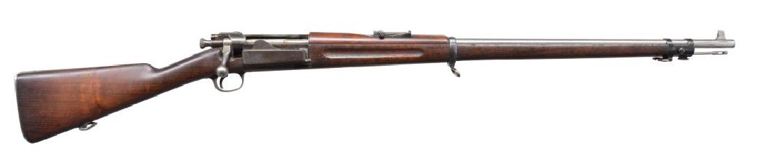SPRINGFIELD 1892 KRAG BOLT ACTION RIFLE.: Cal. 30-40 Krag. S# 5584. Bbl. 30" modern replacement. Rifle is Model 1892 Krag. Receiver dated 1894. Has 1892 ladder rear sight. Has original type front sight installed w/ tall blade. 28 3/8" Ramrod 